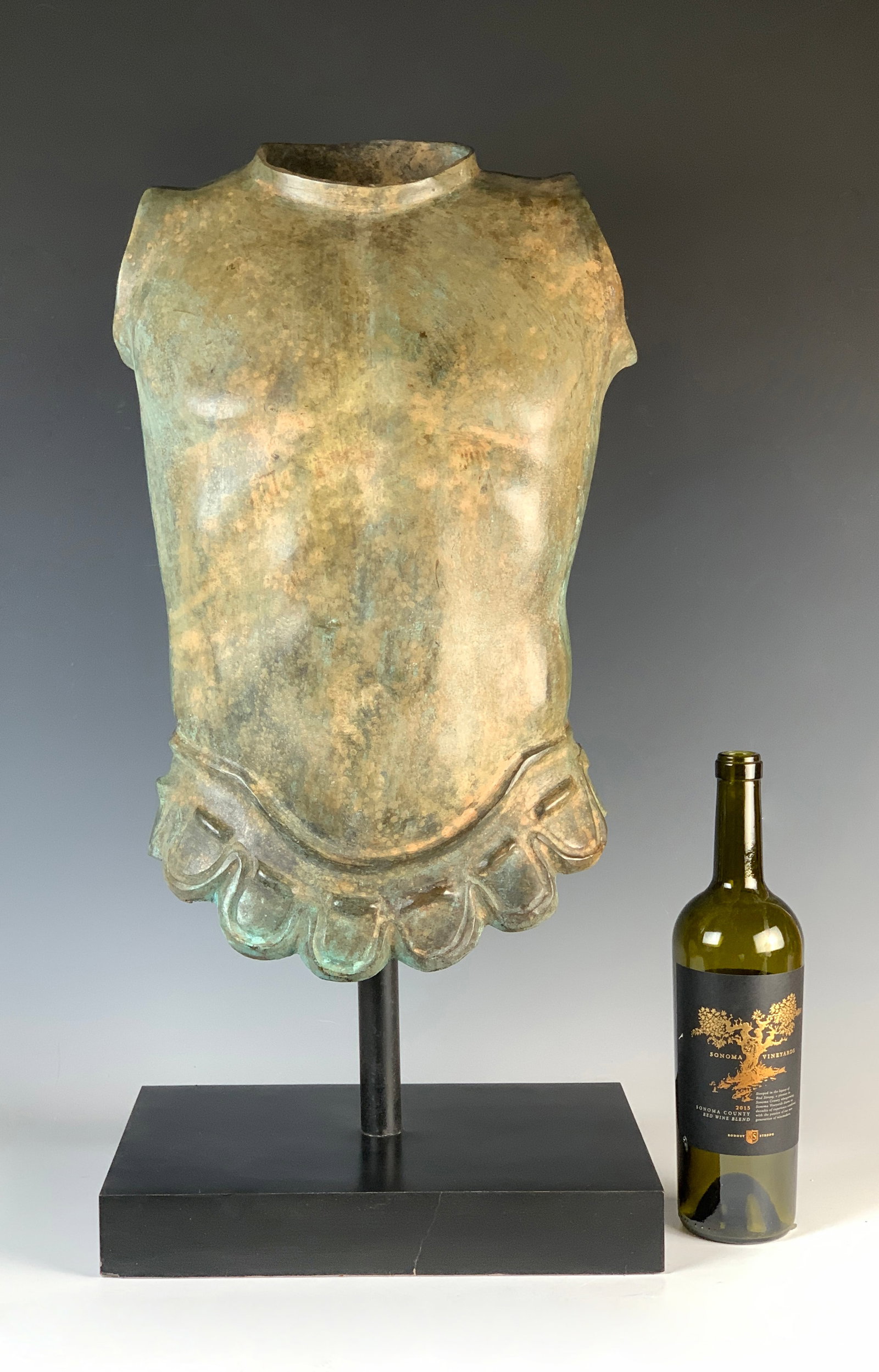 Bronze Cuirass (Body Armor) 20th C.: Vert-de-gris patinated bronze armor mounted on a black composition base. Size: 28" tall, including stand. Condition: Very good.