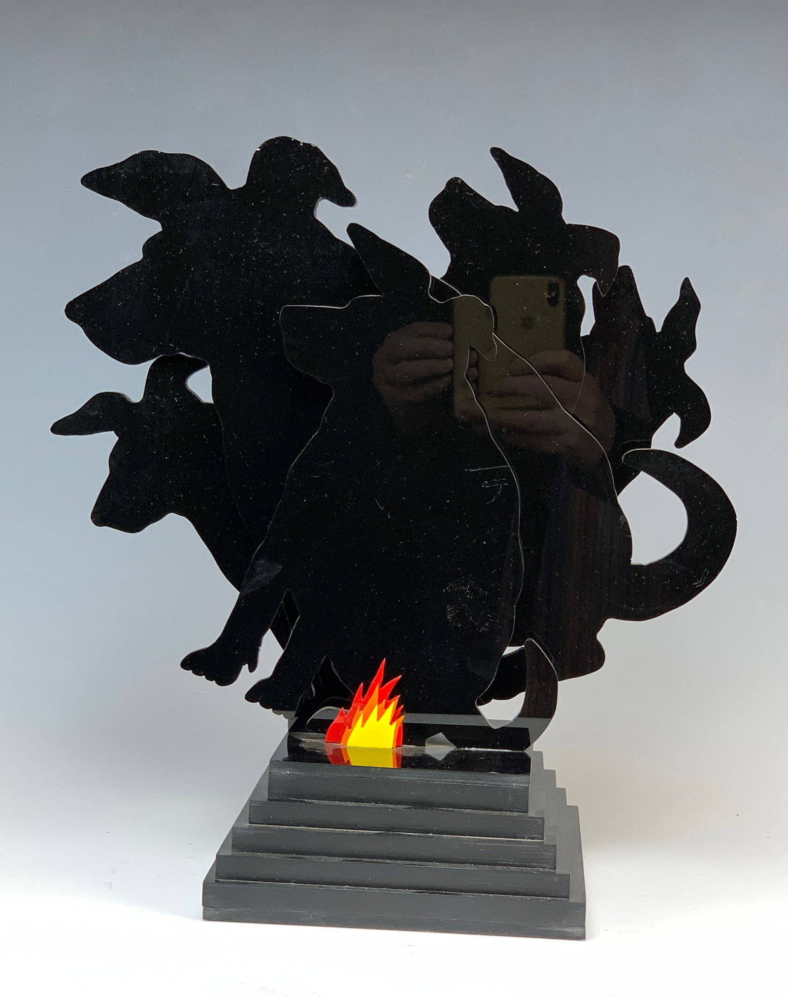 Rare David Gilhooly Acrylic "Hot Paw": Dated 10/27. Also inscribed "the big dogs in the insurance industry". Black acrylic sculpting with a group of 5 dogs on a black acrylic stepped base. Size: 15". Condition very good.