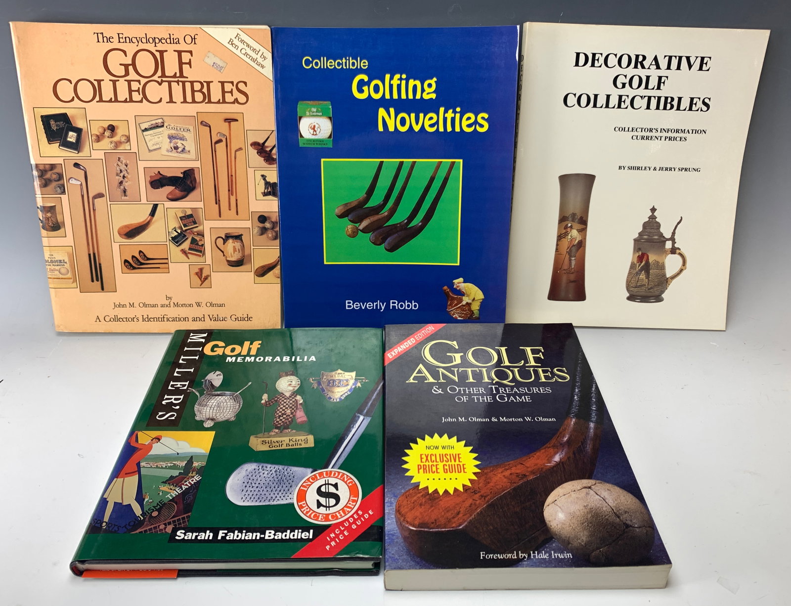 5 Antique Golf Collectibles Books: A collection of five antique golf collectibles books, mostly with price guides: 1. "Golf Antiques and Other Treasures of the Game" by Olman - 291 pages. 2. "Miller's Golf Memorabilia" by Baddiel - 160