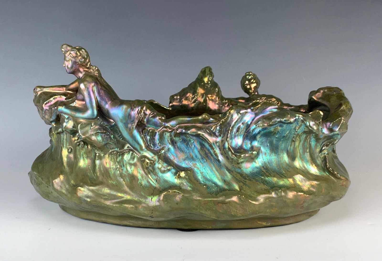Rare Large Figural Clement Massier Bowl: Circa 1900, Clement Massier (1844-1911), a famous French ceramist known for his range of great pottery, especially the iridescent wares. This great piece is large and decorated with a naked woman danc