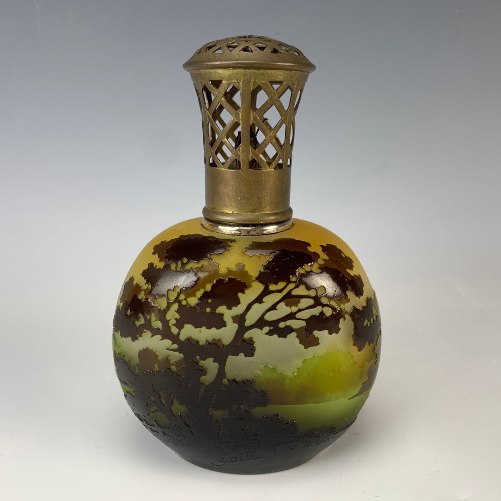 Thomas Webb English Cameo Perfume Bottle: Victorian perfume bottle in three colors with white and pink flowers and leaves and butterfly design on a yellow ground. Sterling silver top with English hallmarks. Size: 6.25" tall. Condition: Very g