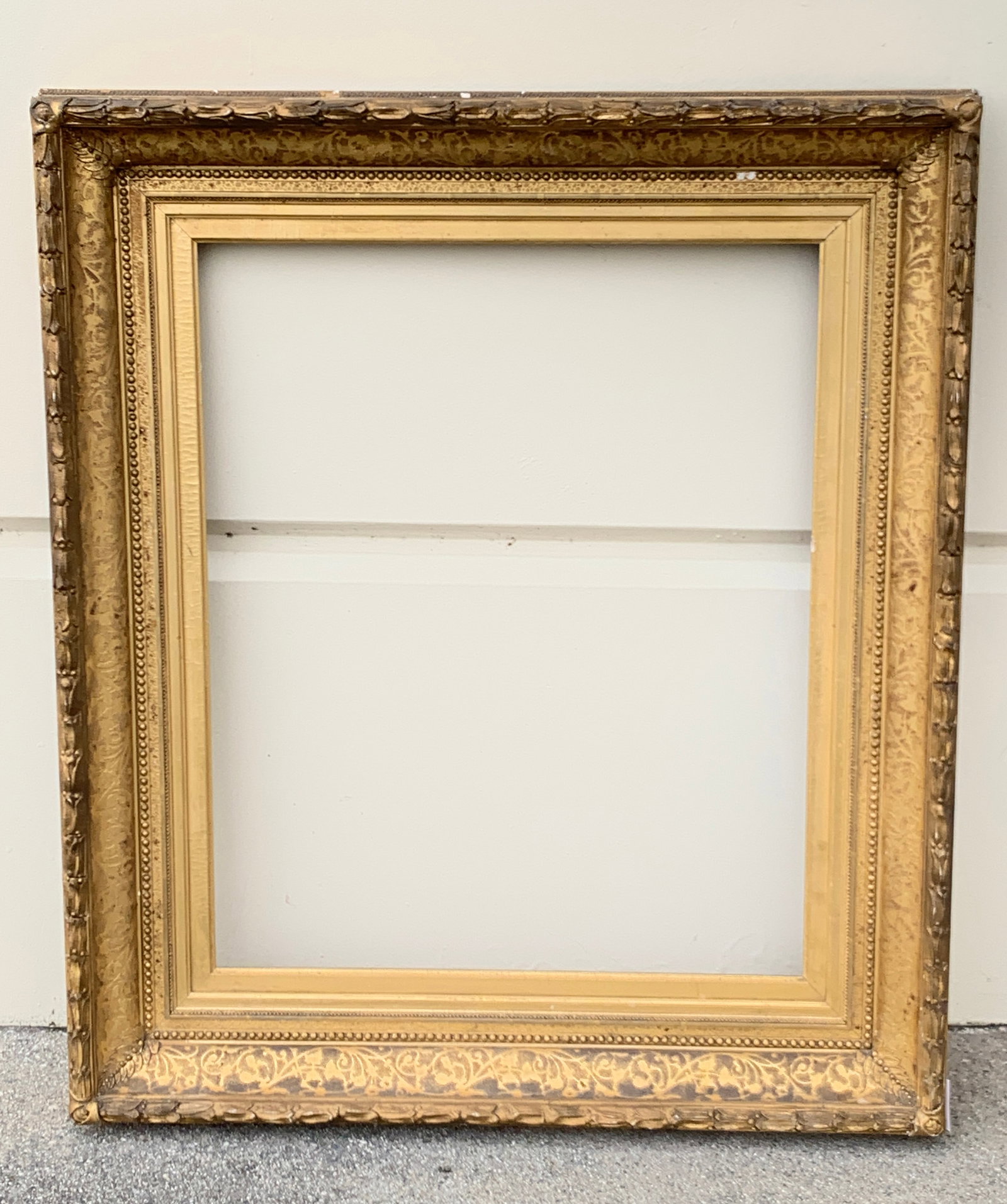 Large Ornate Antique Frame: This is a quality antique frame measuring 27" x 22" inside and 40.4" x 32" outside. Frames like this, new, are very rare and expensive. Sold to the highest bidder. Condition: Very good.
