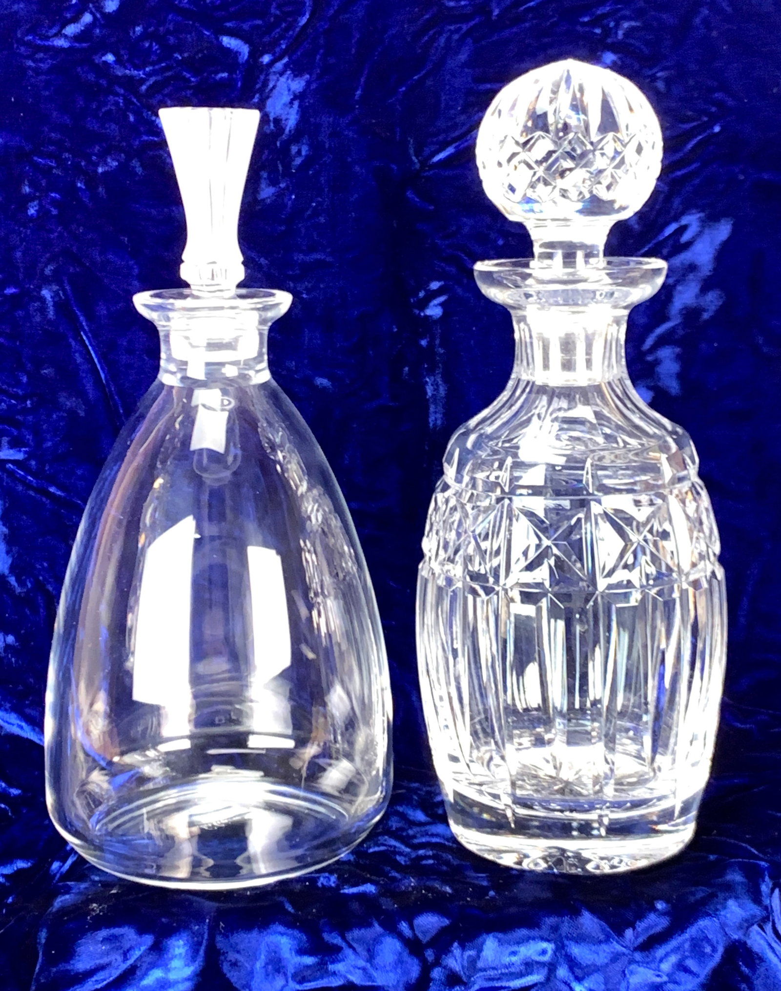 Lalique "Barsac" Decanter Product# 1505100: Lalique "Barsac" Decanter From 2002, Product# 1505100. The decanter measures 10" high x 4 1/2" wide and weighs 2 Ibs. The bottle is clear with a frosted striated stopper. It retired in 2003 at $950.00