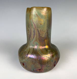 Clement Massier Iridescent Ceramic Vase: An ceramic art nouveau vase in shades of red, green and gold iridescence. Signed. 4" tall. Condition: Good.