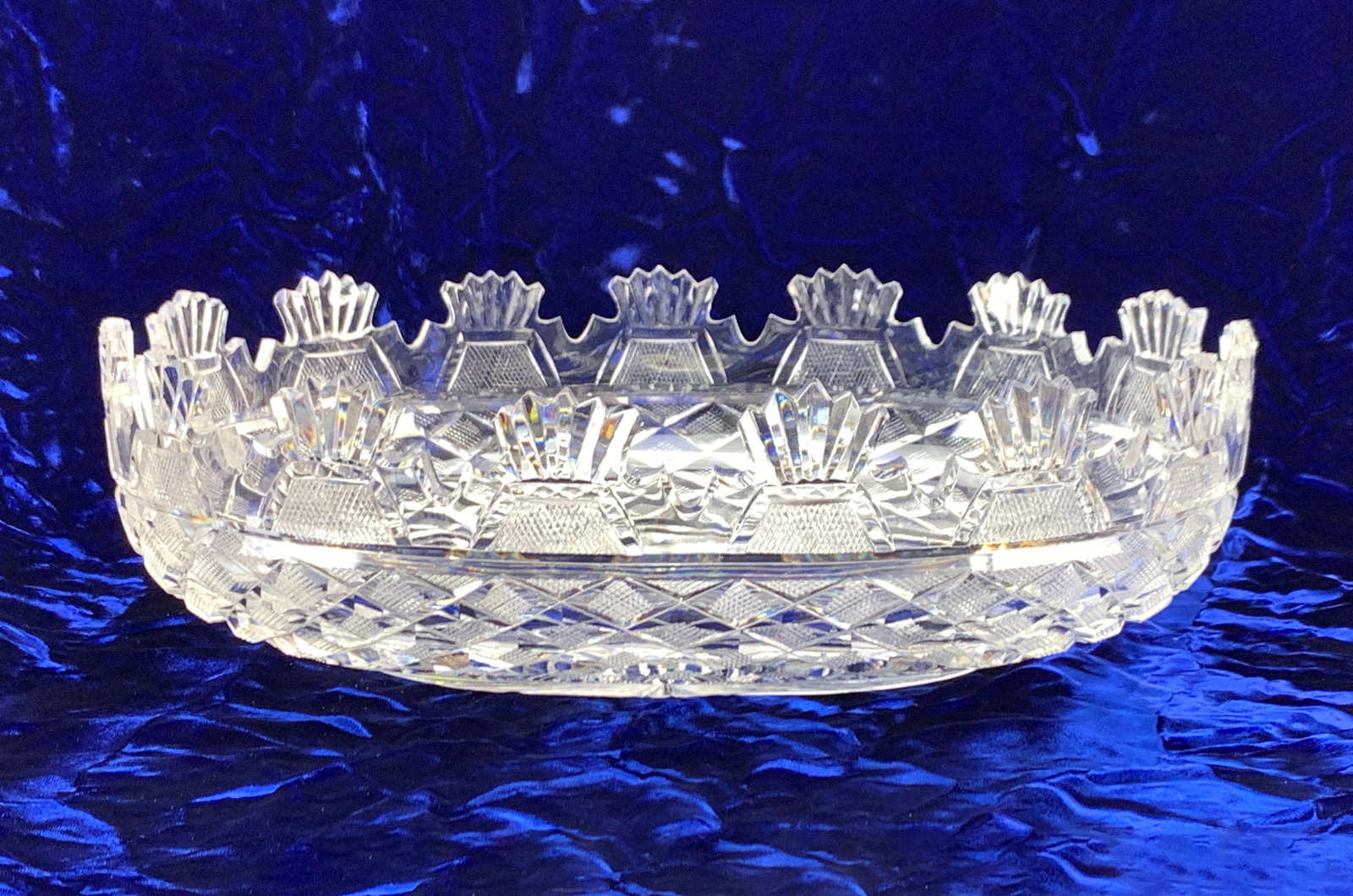 Waterford "Oval Bowl" in Honor of John F. Kennedy: First issued in 1961, this bowl measures 13 1/2" wide x 4 1/2" high x 9 1/2" deep and weighs 5 1/2 Ibs. Condition is excellent.