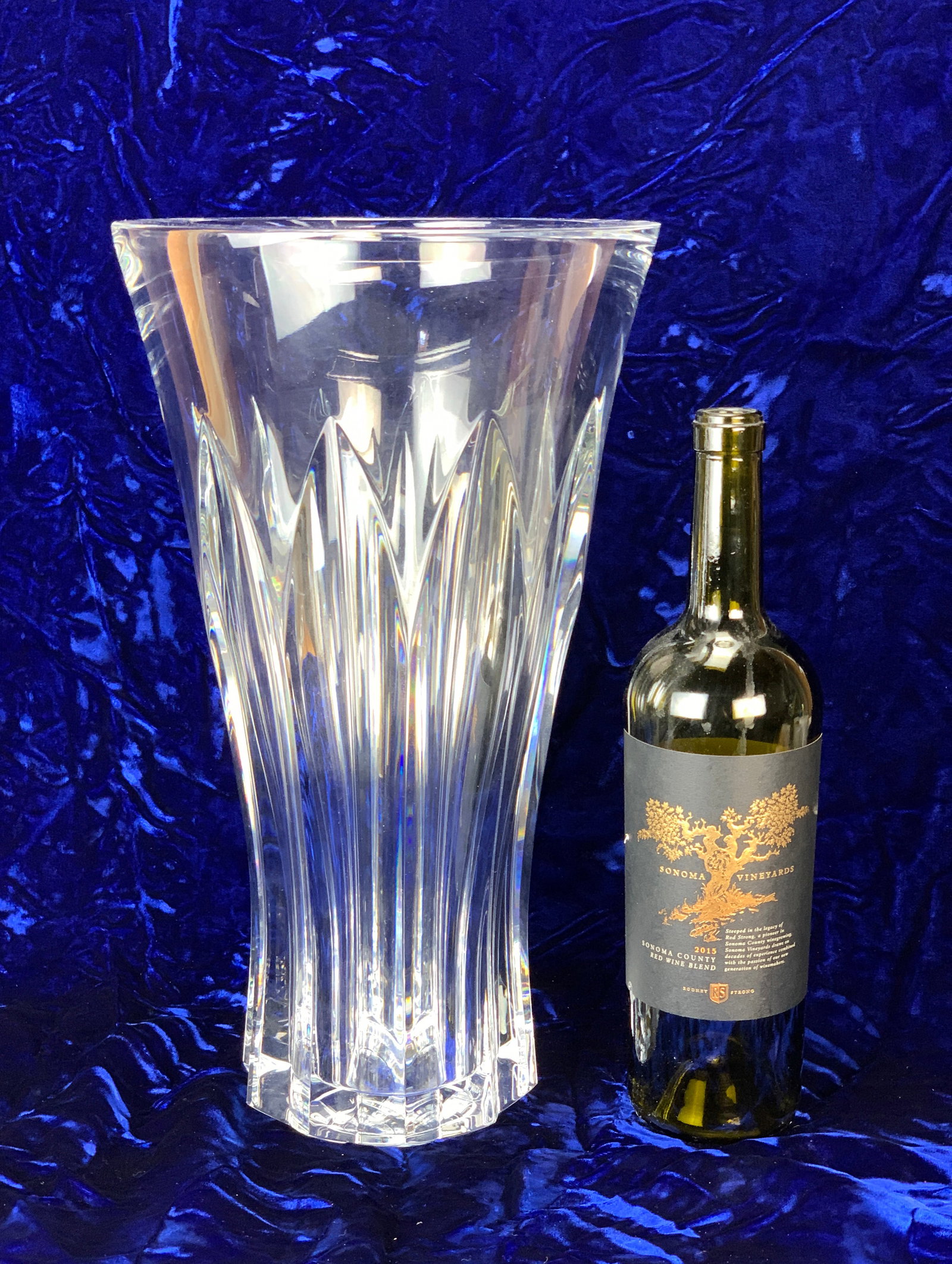 Baccarat Huge "Pauline" Crystal Vase #792445: The vase measures 14 3/4" high x 5 1/2" diameter at the top and weighs a hefty 20 lbs. It has cut panels and is signed on the bottom with the Baccarat logo. It retired at $5,490.00. Condition is excel
