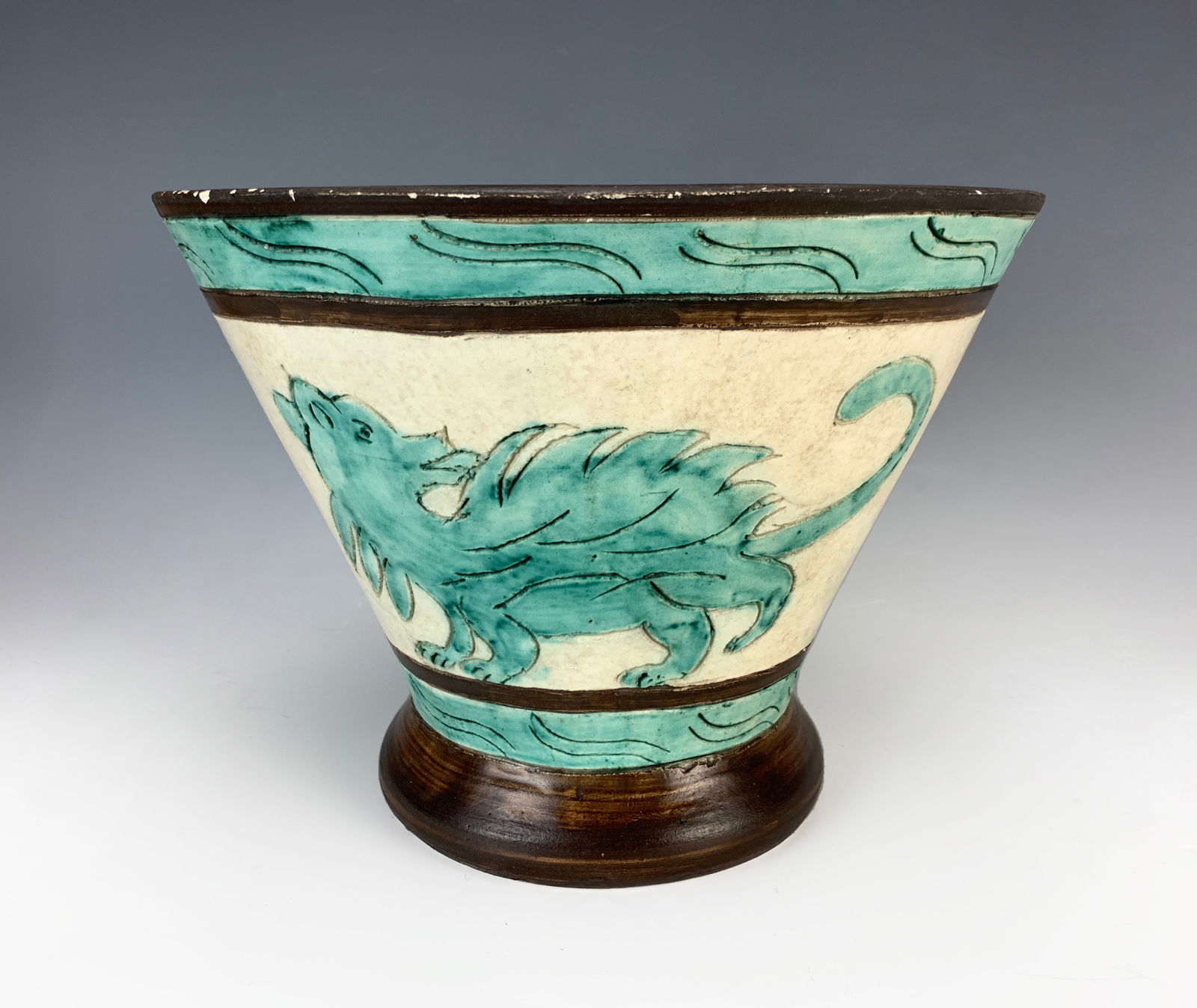 Jerome Massier Pottery Vase w/Chimera & Alligator: Having a conical shape is this rare and wonderful pottery vase decorated with a hand-painted chimera and alligator in colors of green and dark brown. Signed on the bottom "J. Massier, Vallauris," it i