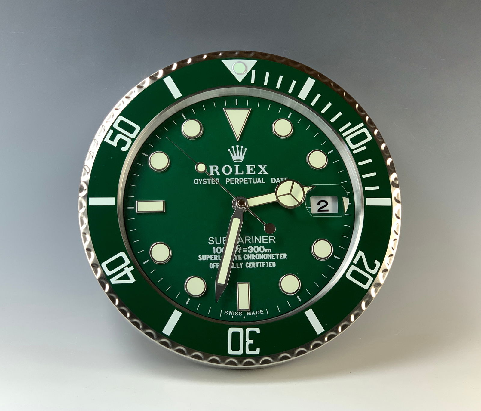 Rolex Submarine Showroom Dealer Clock: Battery-powered, quartz movement. Glow-in-the-dark dial, quality replica. Size: 13" in diameter. Condition: Very good, works fine and keeps accurate time. Note: Clocks and watches are not guaranteed.