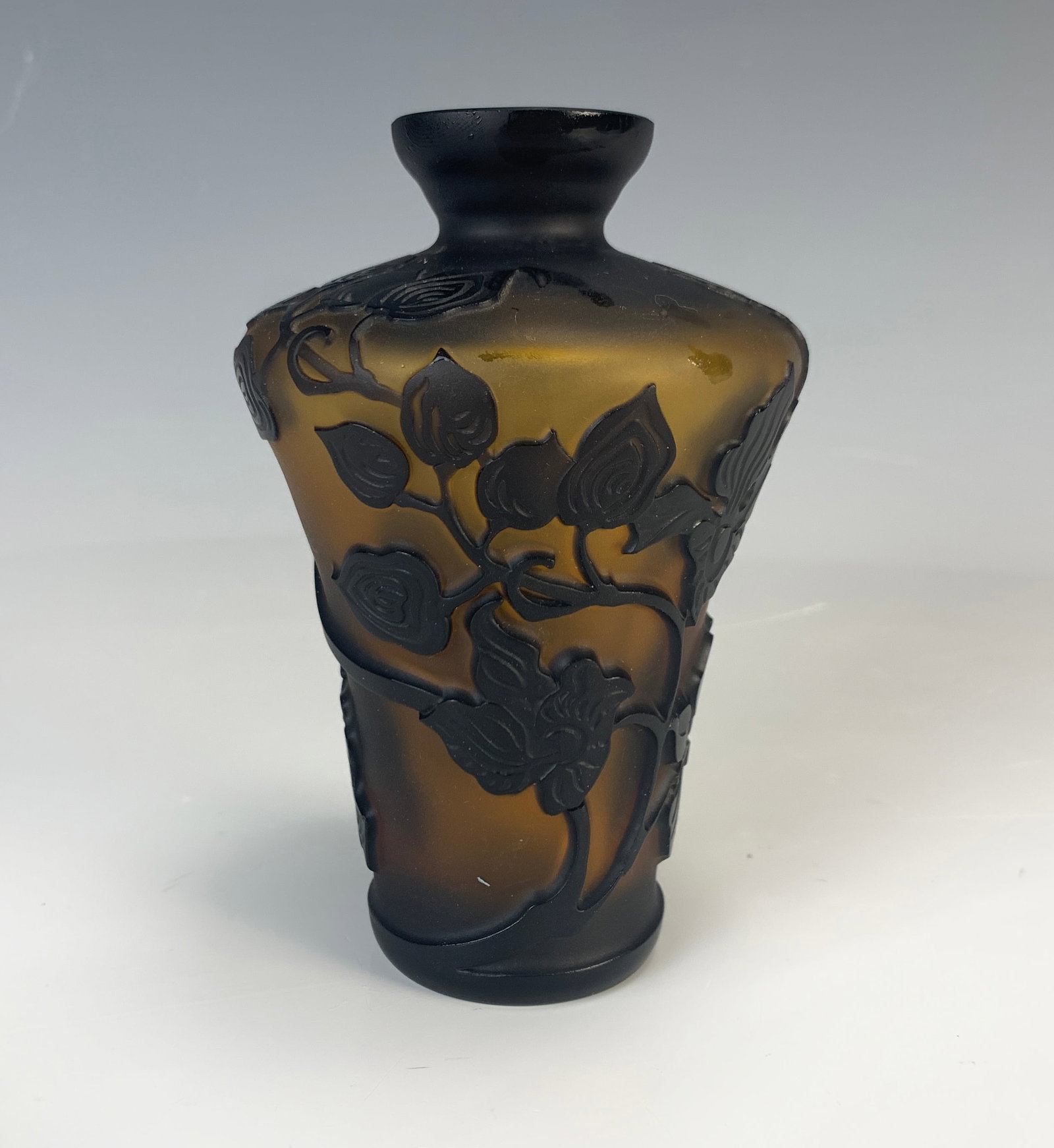 Small Cameo Glass vase "Lelenka" Vase: Small cameo art glass vase signed 'Lelenka', similar in style to Richard or Loetz cameo glass companies in Czechoslovakia. In colors of burnt orange and black, signed on bottom 'Lelenka'. Size: 4.25" 