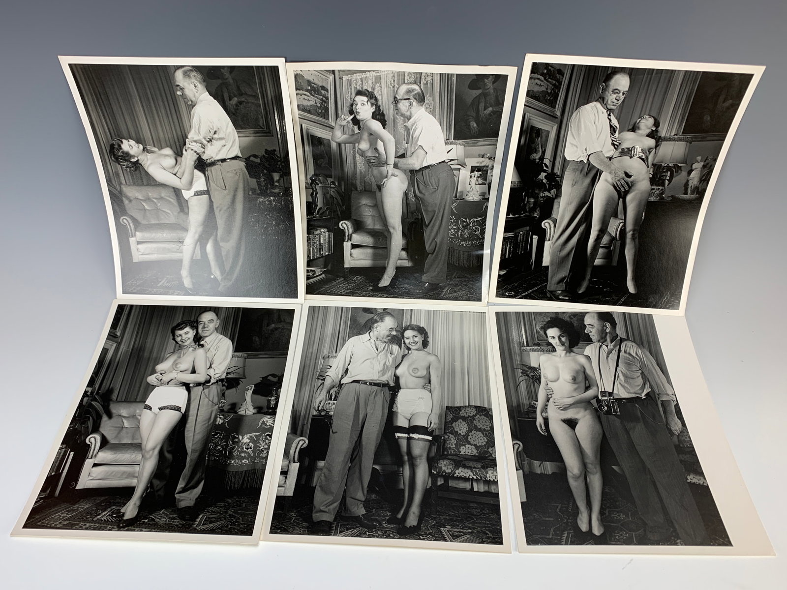 Collection 6 Vintage Erotic Nude Photographs: Circa 1950, 8 vintage albumen silver prints of female nudes and their photographer in humorous poses, size: 10" x 8", a couple of them with minor wrinkle, otherwise in good condition