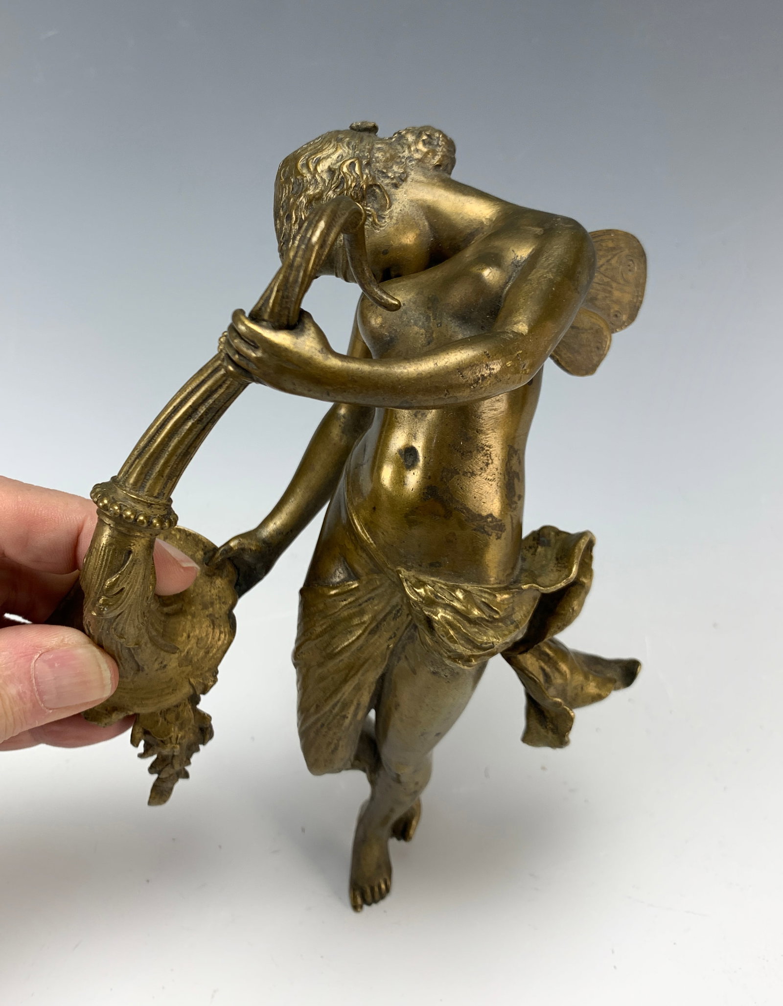 Louis XV Bronze Furniture Mount C.1880: Circa 1880. Fine quality dore bronze decorative furniture. Mount of a winged nymph holding a cornucopia. Size: 9" tall. Condition: Fine.