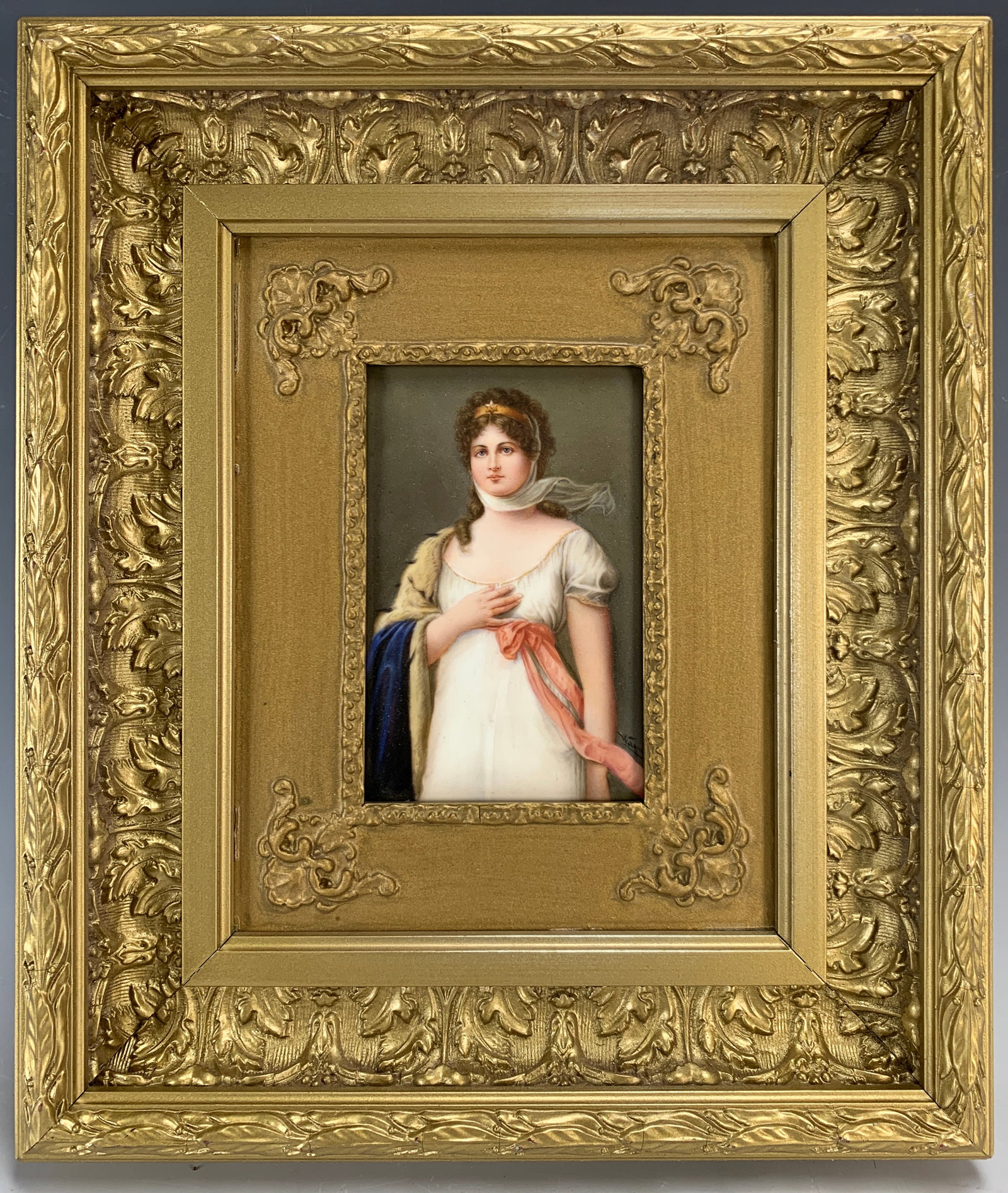 Porcelain Plaque "Queen Louise" Signed Wagner: Hand-painted German porcelain plaque depicting Queen Louise of Prussia, signed lower right by Wagner. Mounted in its original gilt frame. Size: 6" x 4" plaque, with frame 13.5" tall x 11.5" wide. Cond