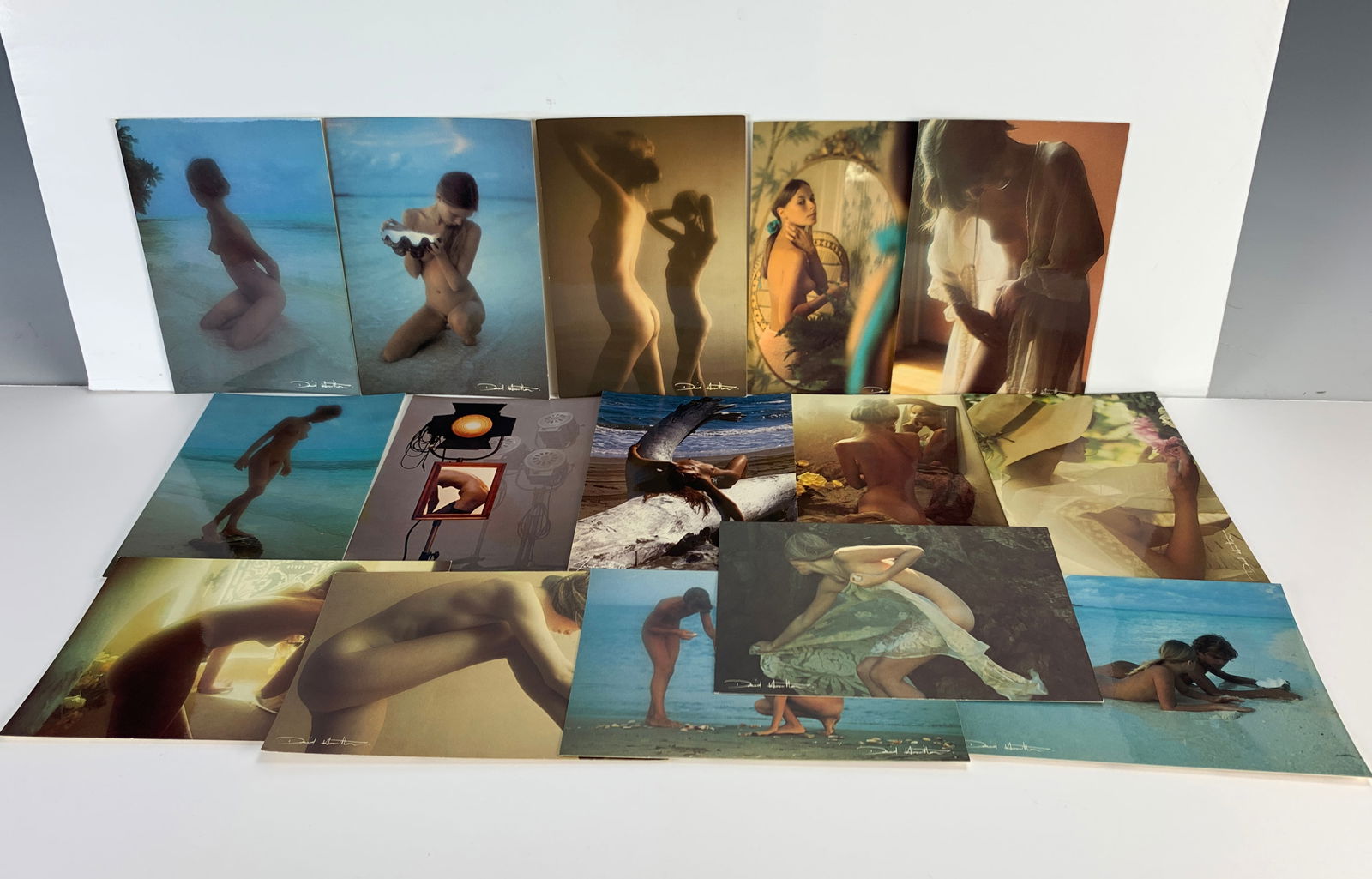 13 Vintage David Hamilton & Photoprint Postcards: Made in France. Includes 13 David Hamilton photo print postcards, one signed by Sam Haskins, and one by Lucien Clergue. Size: 6.75" x 4 5/8". Condition: Good.