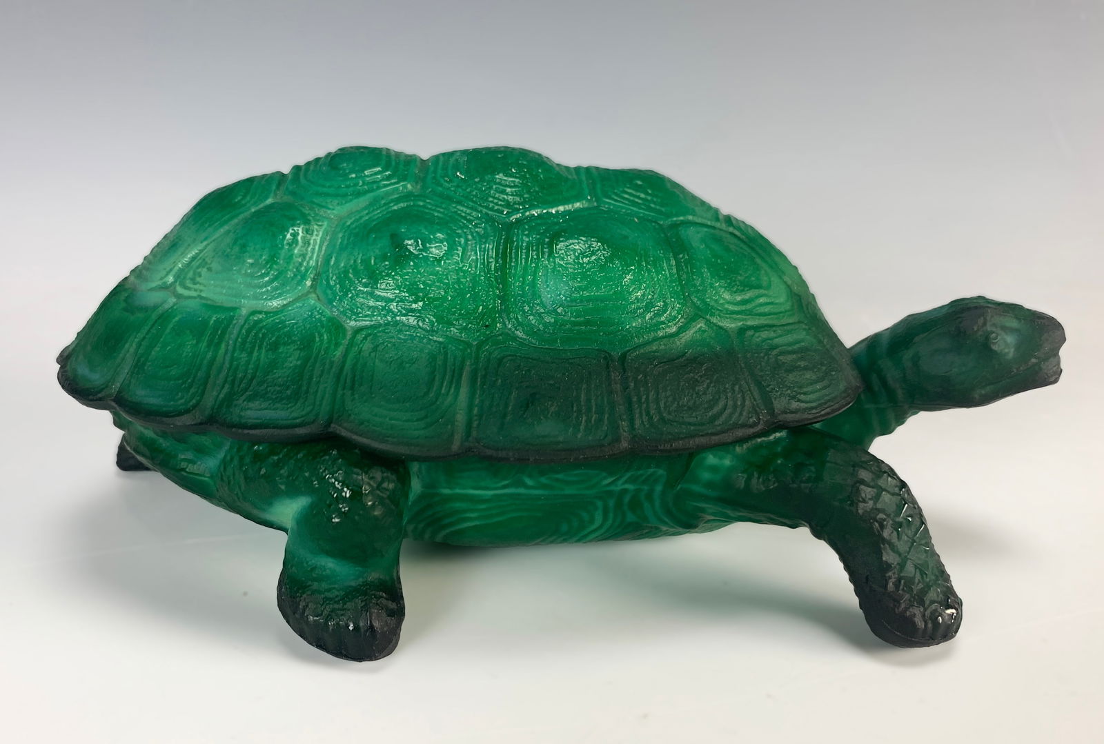 Bohemian Deco Malachite Glass Turtle Moser: An Art Deco malachite glass turtle covered dish, signed Moser. Size: 3.25" tall x 8.50" wide. Condition: very good.