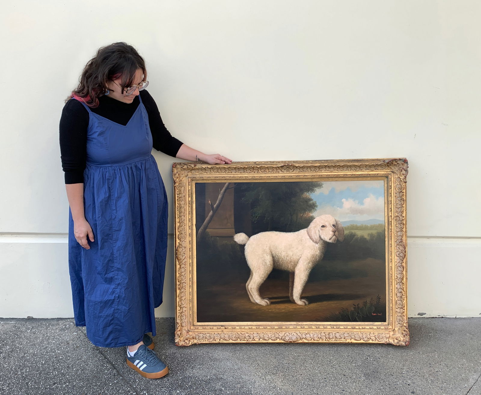 20th Century Large Dog Painting: Oil on canvas. Richard Hines in the manner of George Stubbs. Signed lower right. Mounted in an off-white ornate frame. Size: 39" x 30". With frame: 48" x 39". Condition: Minor repairs.