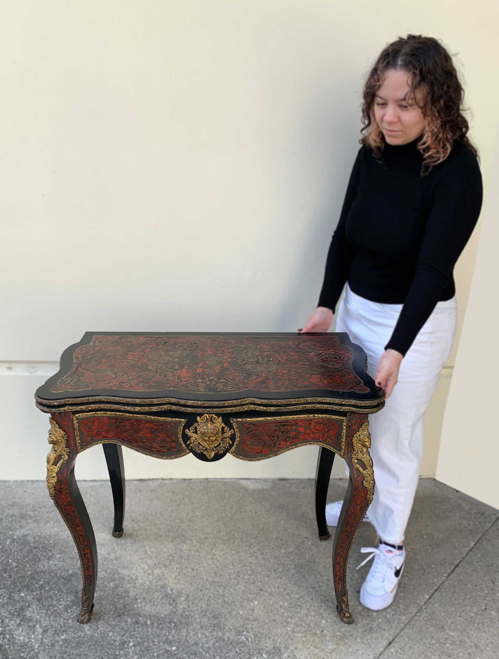 French Boulle Fold Over Card Table 19th Century: French Boulle fold-over card table, 19th century, with bronze mounts. Size: 30.5" tall x 34" wide x 17.5" when folded. Condition: Top needs work.
