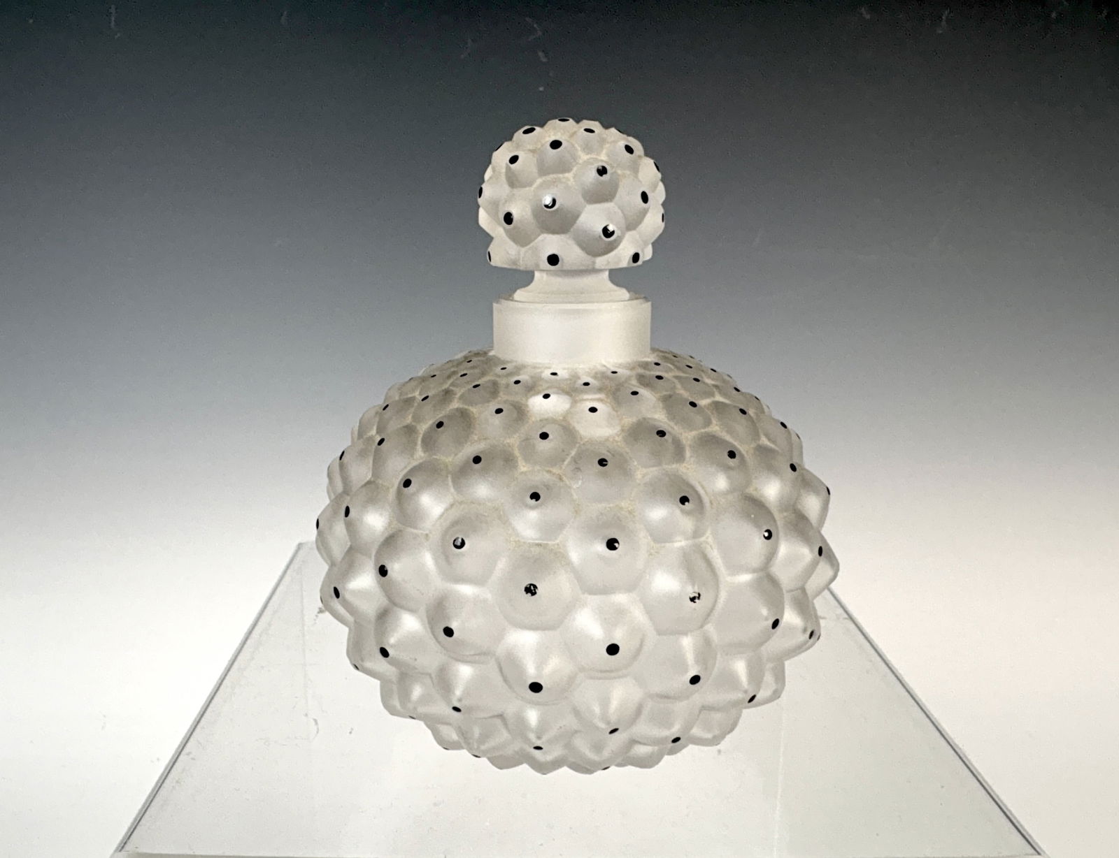 Lalique Cactus Perfume Bottle: Classic Lalique perfume bottle in the popular Cactus pattern, signed "Lalique France", with stopper, in good condition, 5" x 4.5" *In-house shipping within the U.S. available for this lot*