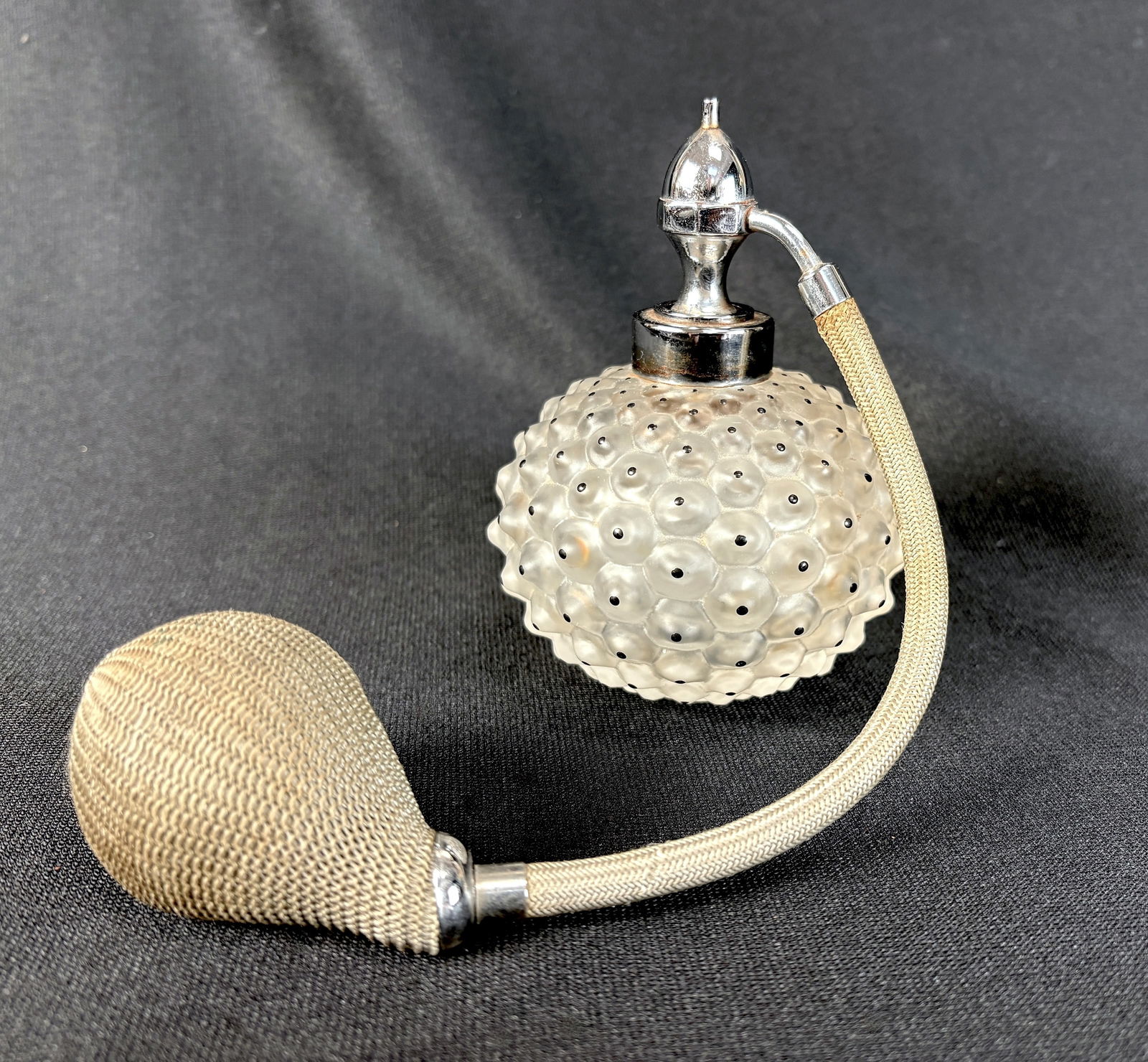 Lalique Cactus Perfume Atomizer: Lalique perfume bottle with atomizer in the Cactus pattern, signed on bottom "Lalique France", in good condition, 4.5" x 3.25" *In-house shipping within the U.S. available for this lot*