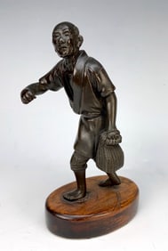 Japanese Bronze Figure of Man with Basket