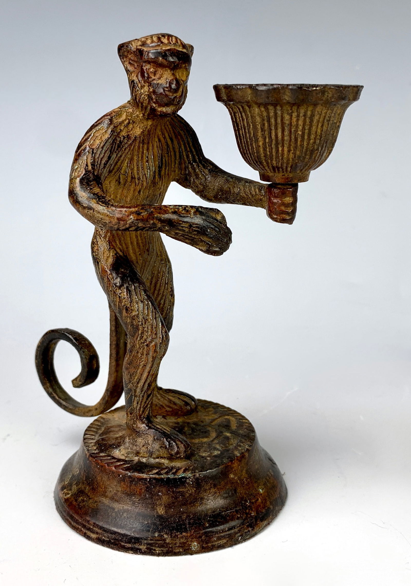 Antique Bronze Monkey Candlestick: Very nice bronze figural candlestick of a standing monkey, tail forms the handle, good condition. 5.25" tall *In-house shipping within the U.S. available for this lot*