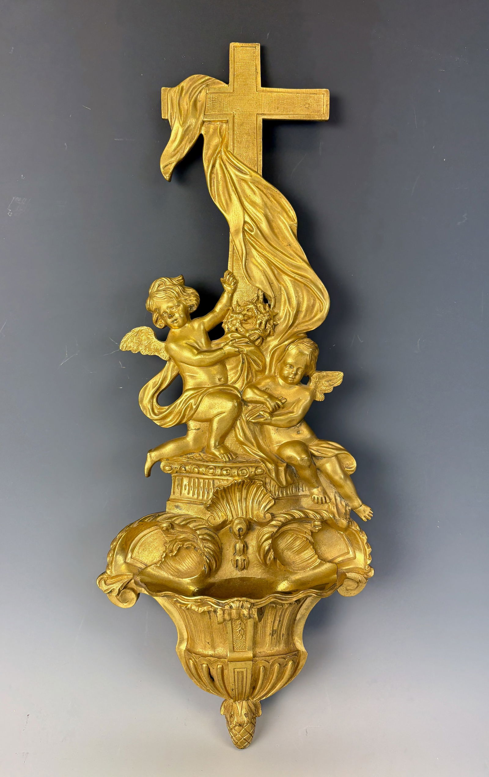 Continental Dore Bronze Holy Water Font: Circa 1900, fine quality dore' bronze Holy water font with winged putti before a draped cross, very good condition, 17" long *In-house shipping within the U.S. available for this lot*