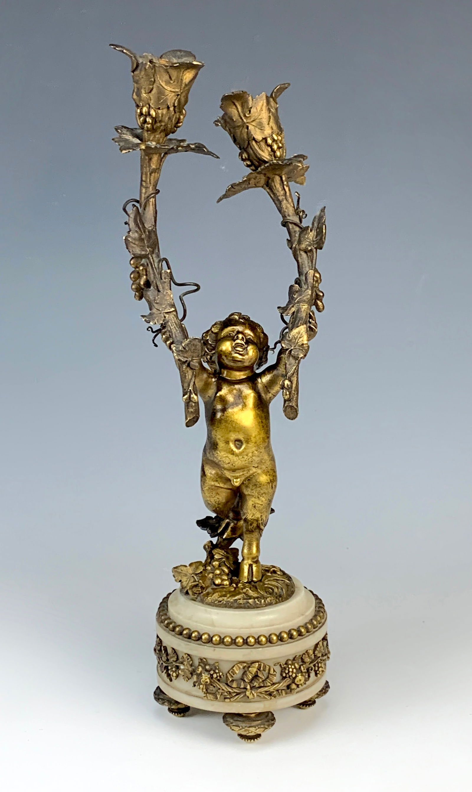 Francois Linke Rare Bronze Faun 2 Light Lamp: Circa 1880. Francois Linke (1855-1946) Offering this rare bronze double lamp signed "Linke". Depicts a faun supporting 2 branches of lamps, base of the bronze it is marked "Clodion". Resting on a whit