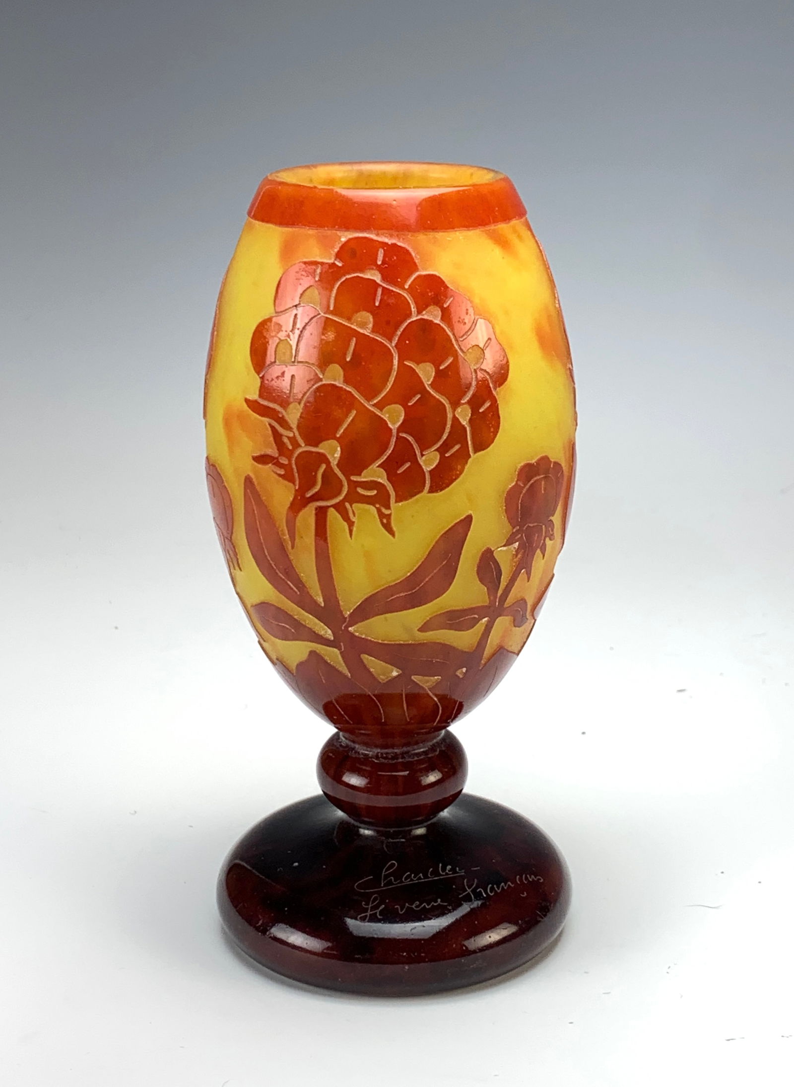 Le Verre Francais Charder Cameo Glass Vase: Circa 1920, French cameo art glass glass vase having red carved flowers over a deep yellow ground, signed "Charder" and "Le Verre Francais", very good condition, 6.75" tall *In-house shipping within t