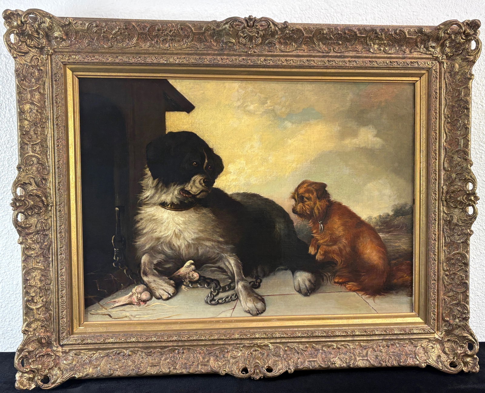 George Horlor "The Temptation" Oil Painting: George William Horlor, (British 1820-1899) an original oil on canvas titled "The Temptation" dated 1871 of a St. Bernard with a bone alongside a wishful terrier, mounted in its original gilt frame. Si