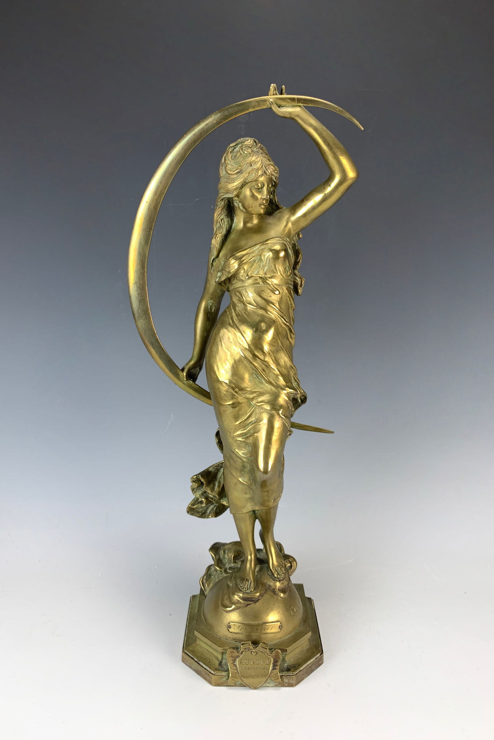 Bronze Sculpture"L. Aurore" by Auguste Moreau Sgd: Auguste Moreau (1834-1917) Gilt bronze figure by well-known sculptor August Moreau titled "Aurore". Signed Aug. Moreau, has a plaque, very good condition,19" tall.