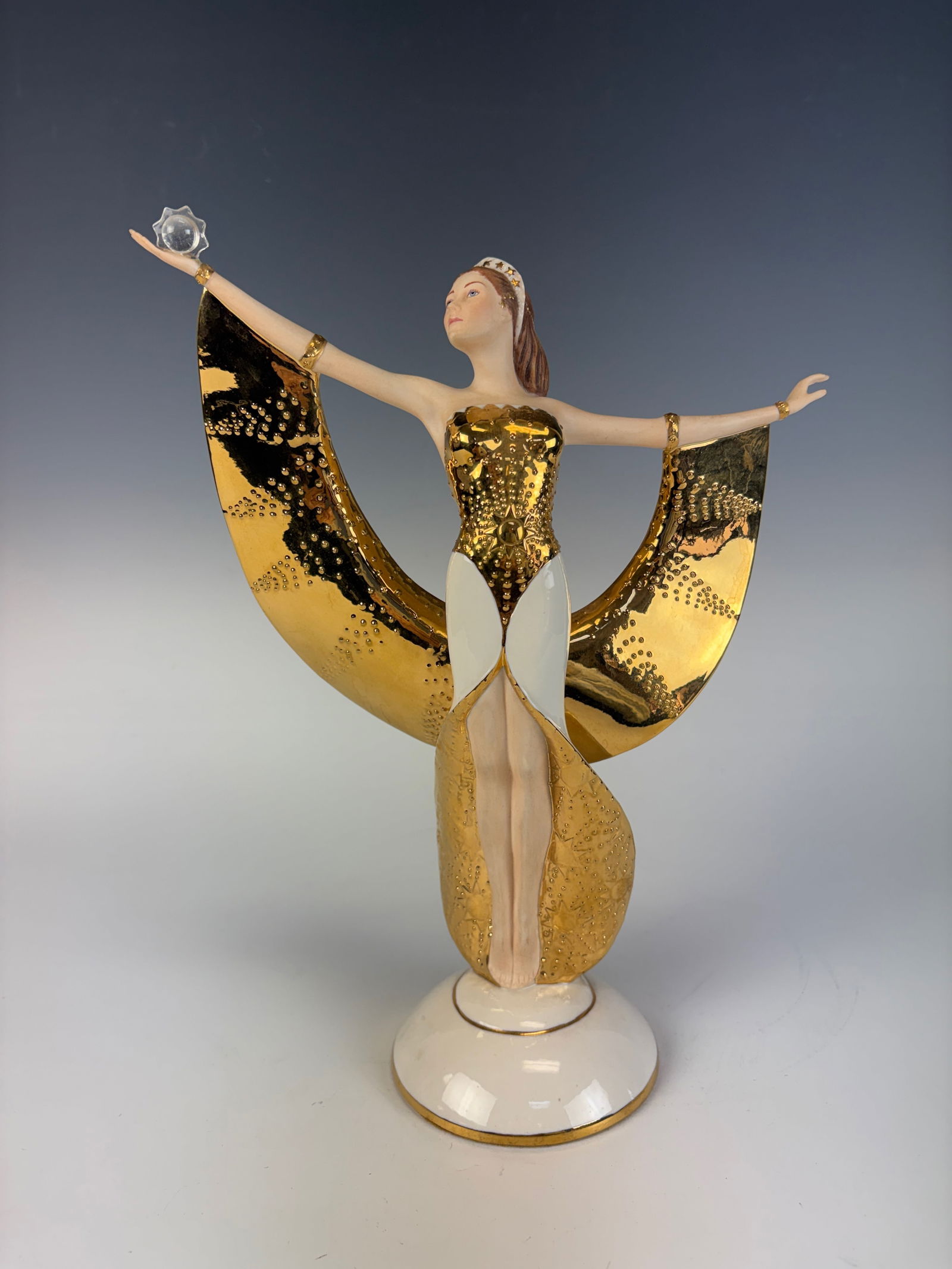 Franklin Mint Sunrise in Gold Porcelain Figurine: A beautiful Franklin Mint fine porcelain figurine depicting an elegant female figure, in excellent condition 11”tall × 8.5”wide × 3.5”deep.