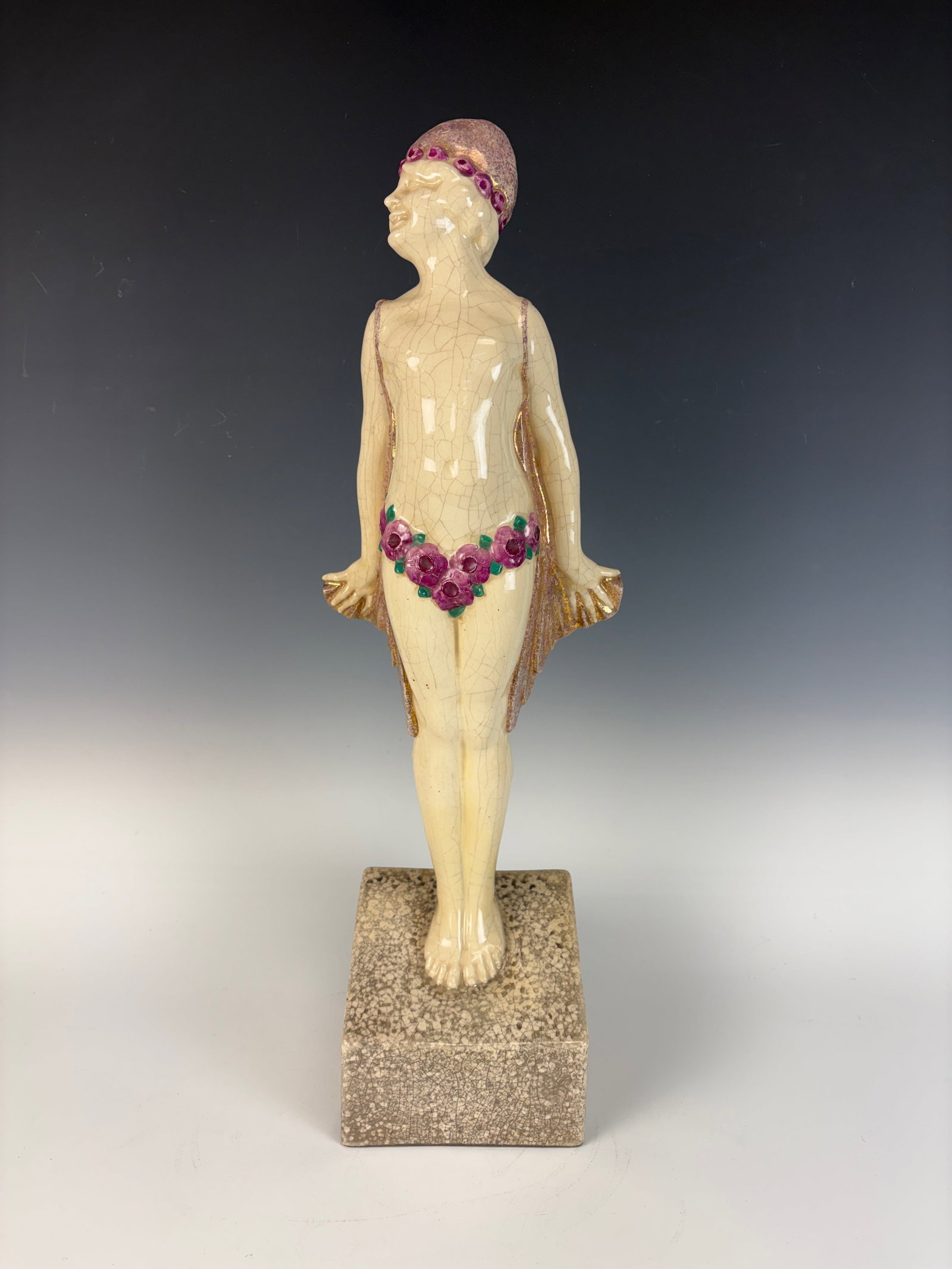 Oscar Zadoury Art Deco Dancer w Flowers Figurine: Signed O. (Oscar) Zadoury and C.H. France,. a striking tall Art Deco figurine depicting a nude woman with flowers. Made of polychrome crackle-glazed earthenware, excellent condition, 21.5” tall