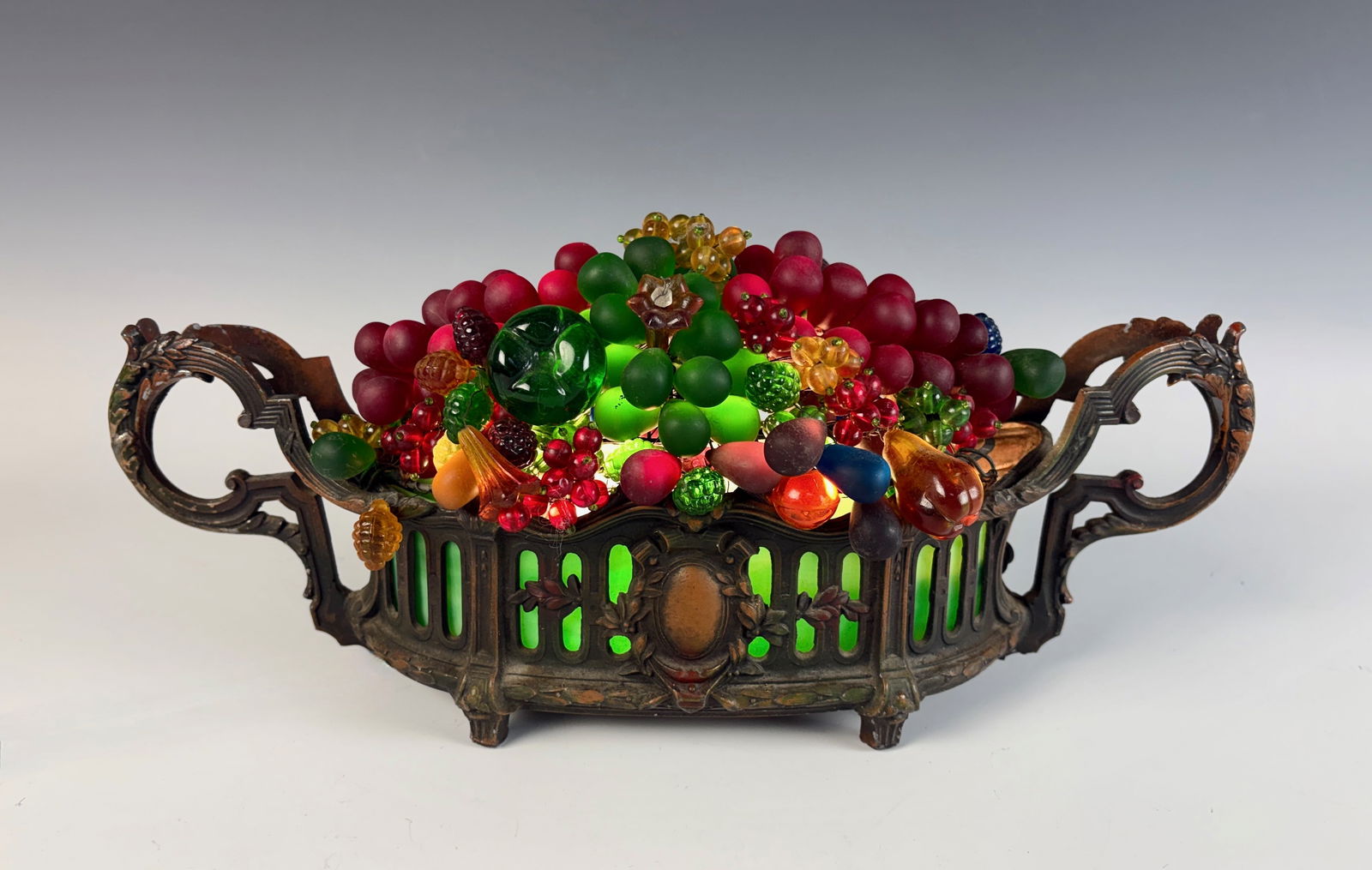 Basket of Fruit Glass Jewels Lamp: Circa 1920, colorful double handled vintage lamp with assorted satin finished multicolored glass jewels as the shade, good condition overall with extra jewels to be added, 14" x 6"