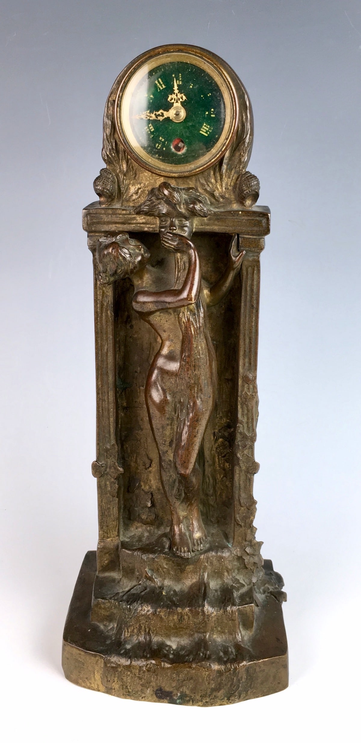 Art Nouveau Bronze Clock by Charles Korschann: Charles Korschann (1872-1943), depicting a nouveau nude maiden bathing beneath a fountain, the source of the flow from the mouth of Medusa, ivy climbs the pillars and the case is decorated with foliag