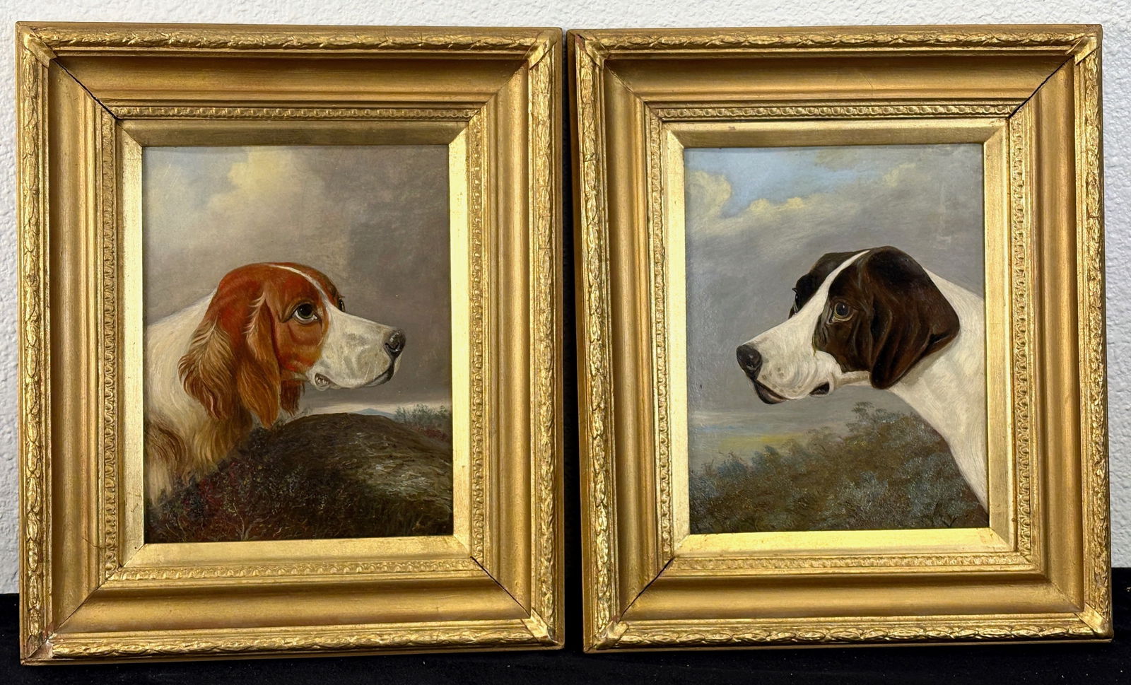 Pair of Colin Graeme Gun Dog Paintings: A charming pair of oils on board depicting two gun dogs by Scottish artist Colin Graeme Roe (1858–1910) One painting indistinctly signed with initials. In good condition, frames have minor chips. Si
