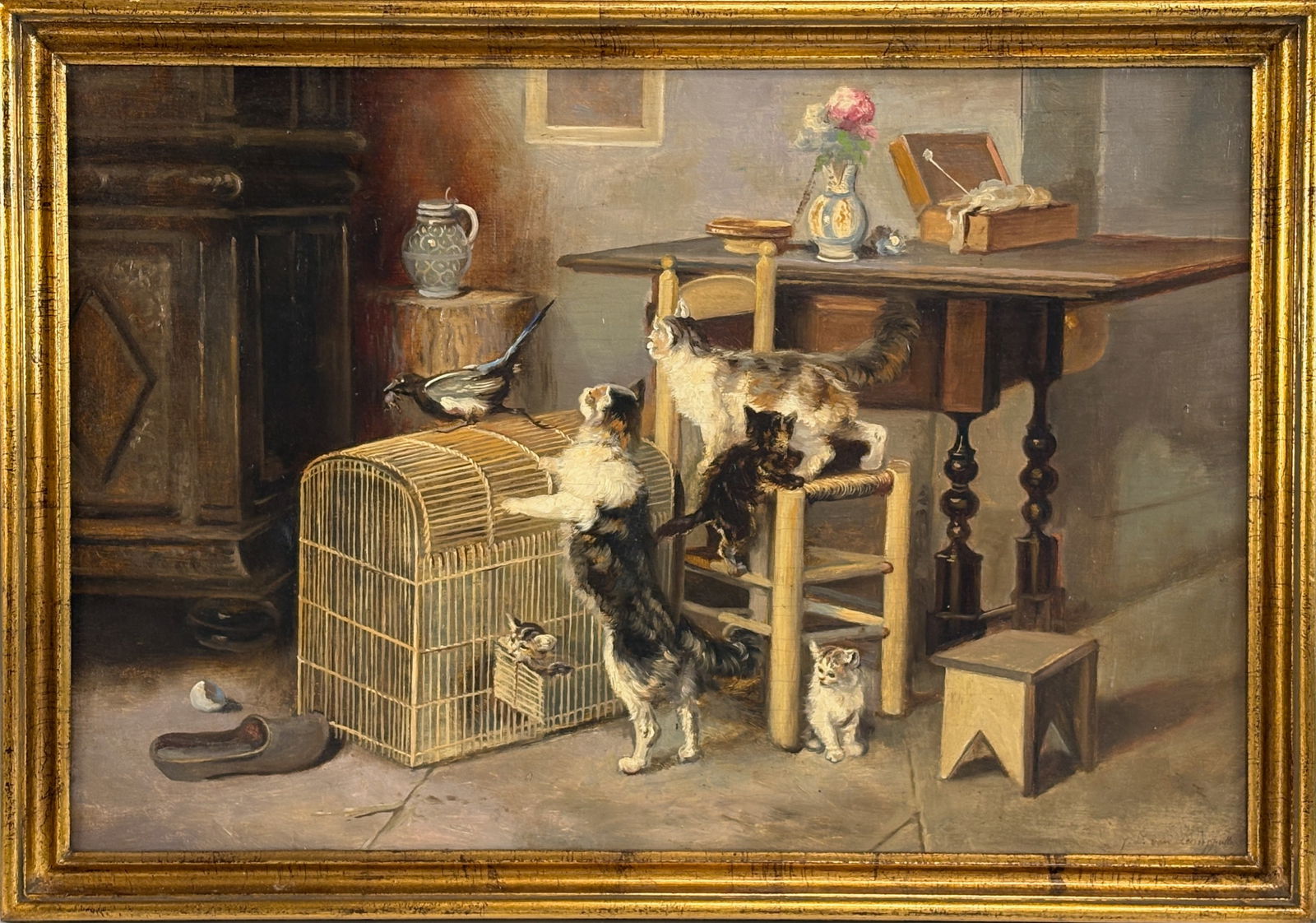 J.L. Van Leemputten “Cats on Hunt" Painting: A great cat painting on panel depicting a lively group of five cats frolicking as they chase a magpie. Signed lower left. J.L. Van Leemputten, also known as Jef Louis Leemputten, and mounted in gilt f