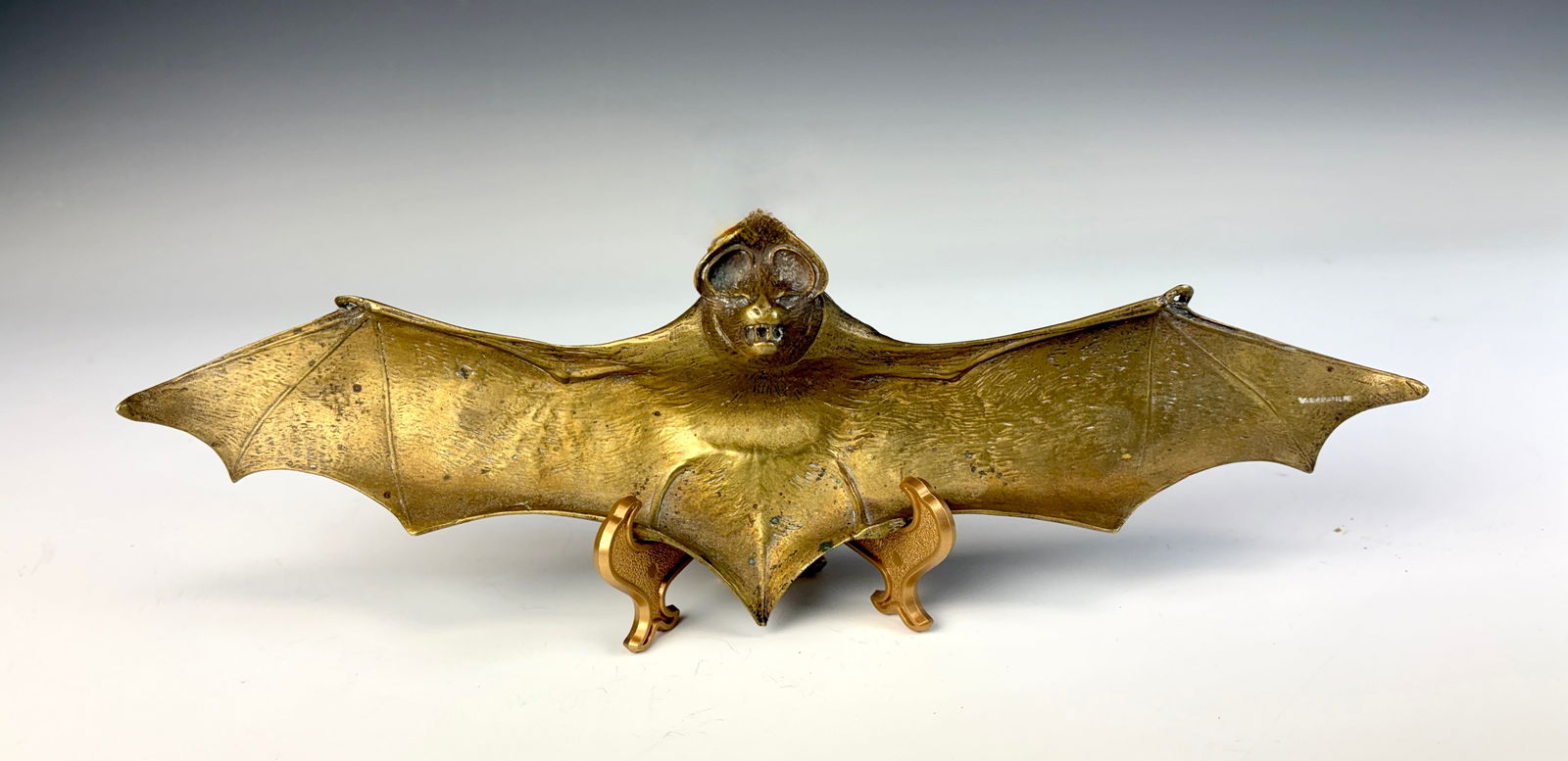 Rare Gilt Bronze Bat inkwell sgd. by V. Sabatier: Late 19th century, rare gilt bronze inkwell modeled as an open winged bat, with insert. Signed Victor Sabatier, very good condition. 13.5” wide x 3.75” deep 1.75” tall.
