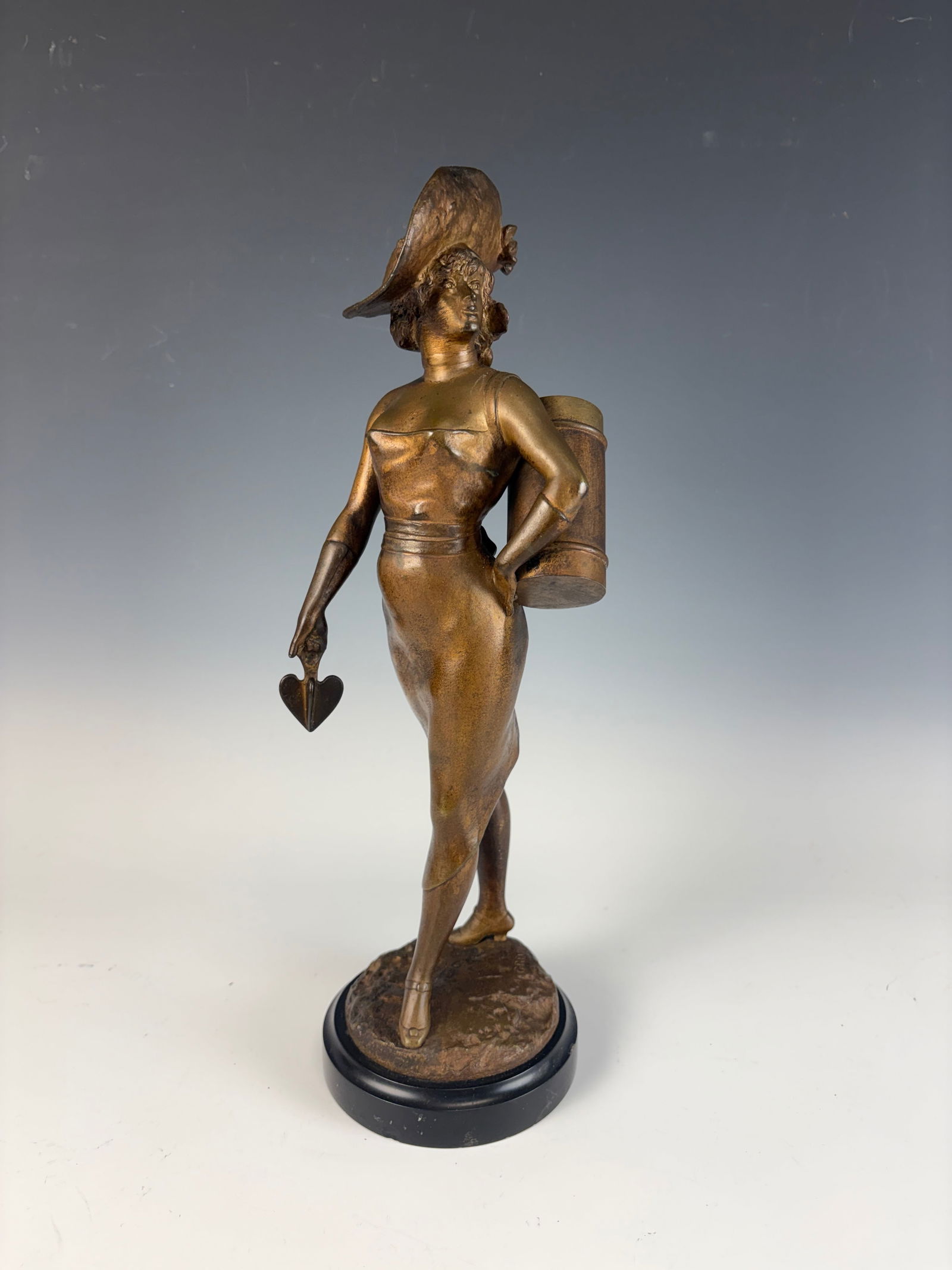 Alfred Grevin Bronze Female Fortune Teller: Circa 1860 .Alfred Grevin (1827-1892) Alfred Grevin, 19th C caricaturist and sculptor known for his elegant Parisian women, a fabulous signed bronze of a lady with large hat and carrying a rotating