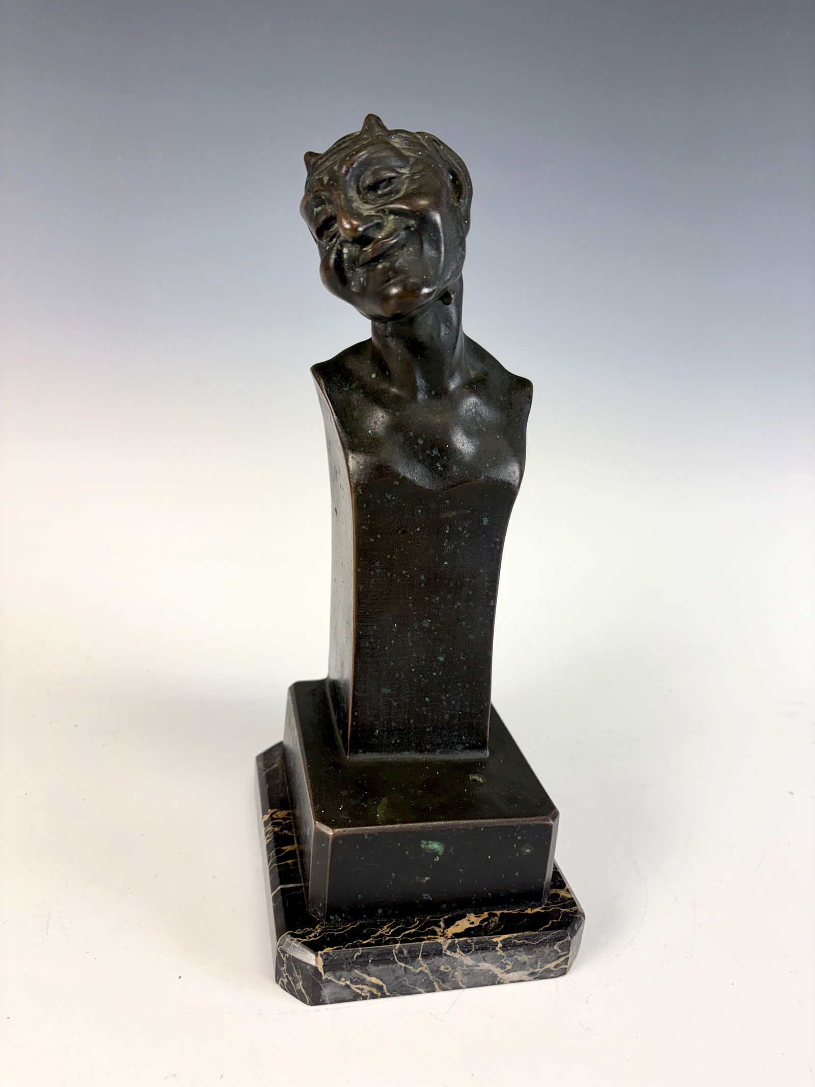 Bruno Zach Devil w Hidden Naughty Surprise Bronze: A rare Austrian bronze attributed to Bruno Zach, depicting a smiling devil’s head atop a pedestal base. When the devil figure is removed from the base, it reveals a concealed erotic element, charact