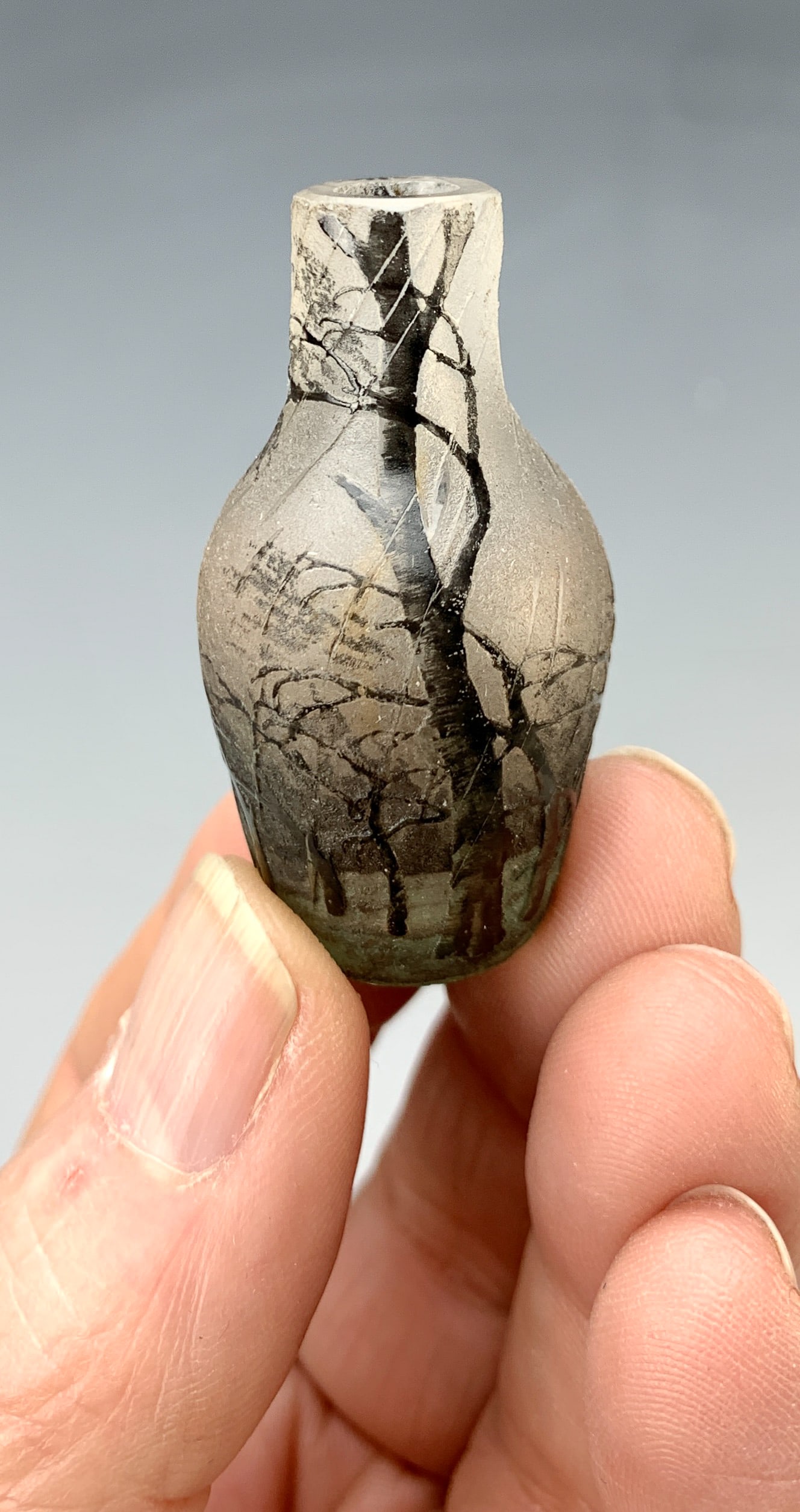 Daum Nancy "Rain Scene" Miniature Vase: Rare miniature "Trees in the Rain" vase, ovoid shape with a straight neck, signed Daum Nancy with cross of Lorraine. Size: 1.75" tall. Condition: Very good.