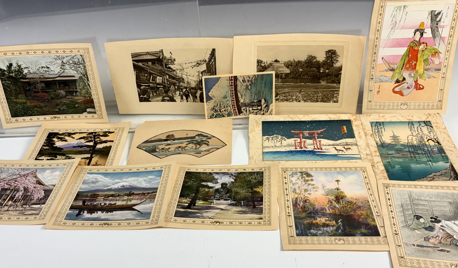 28 Asian Prints, Lafcadio Hearn (Koizumi Yakumo): Group of 28 Asian/Japanese prints, 15 referring to Lafcadio Hearn, (Ireland 1850-1904) and 13 scenic images. Hearn was also known as Koizumi Yakumo. Hearn is most well known in Japan for his endeavors