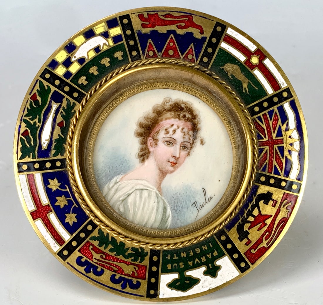 Miniature Painting "Lady with Headband": Circa 1900, artist signed "Poulin", circular painting on bone of a lady wearing a headband, mounted in a gilt bronze and enamel frame, decorated with country flags, very good condition, sight 1.5" dia