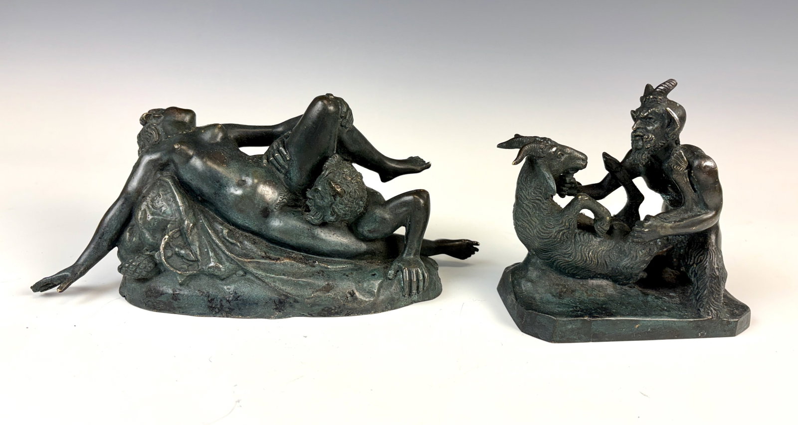 Two Erotic Bronze Figurines: Lot of 2 erotic bronze sculptures, one a faun and goat, the other of a satyr with a woman, no marks, good condition, each 9.5" x 4.5".Eligible for in-house shipping (U.S. only). Please inquire.