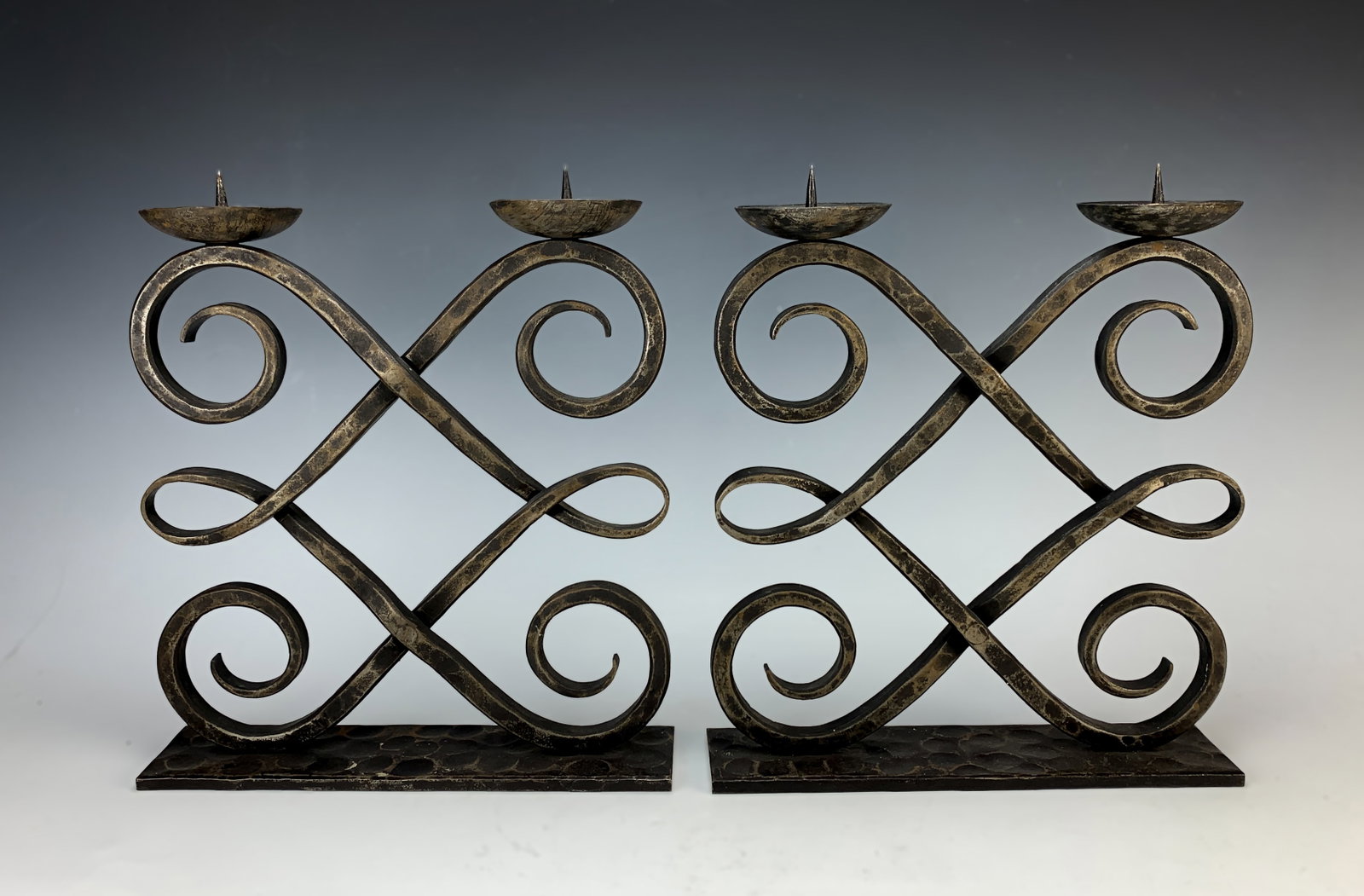 Pair Zadounaisky Wrought Iron Candlesticks: Circa 1930, Pair Michel Zadounaisky (France 1903-1893) wrought iron double candlesticks signed "Zadounaisky" , Zadounaisky is well known for his iron sculptures and have sold at Sotheby's and
