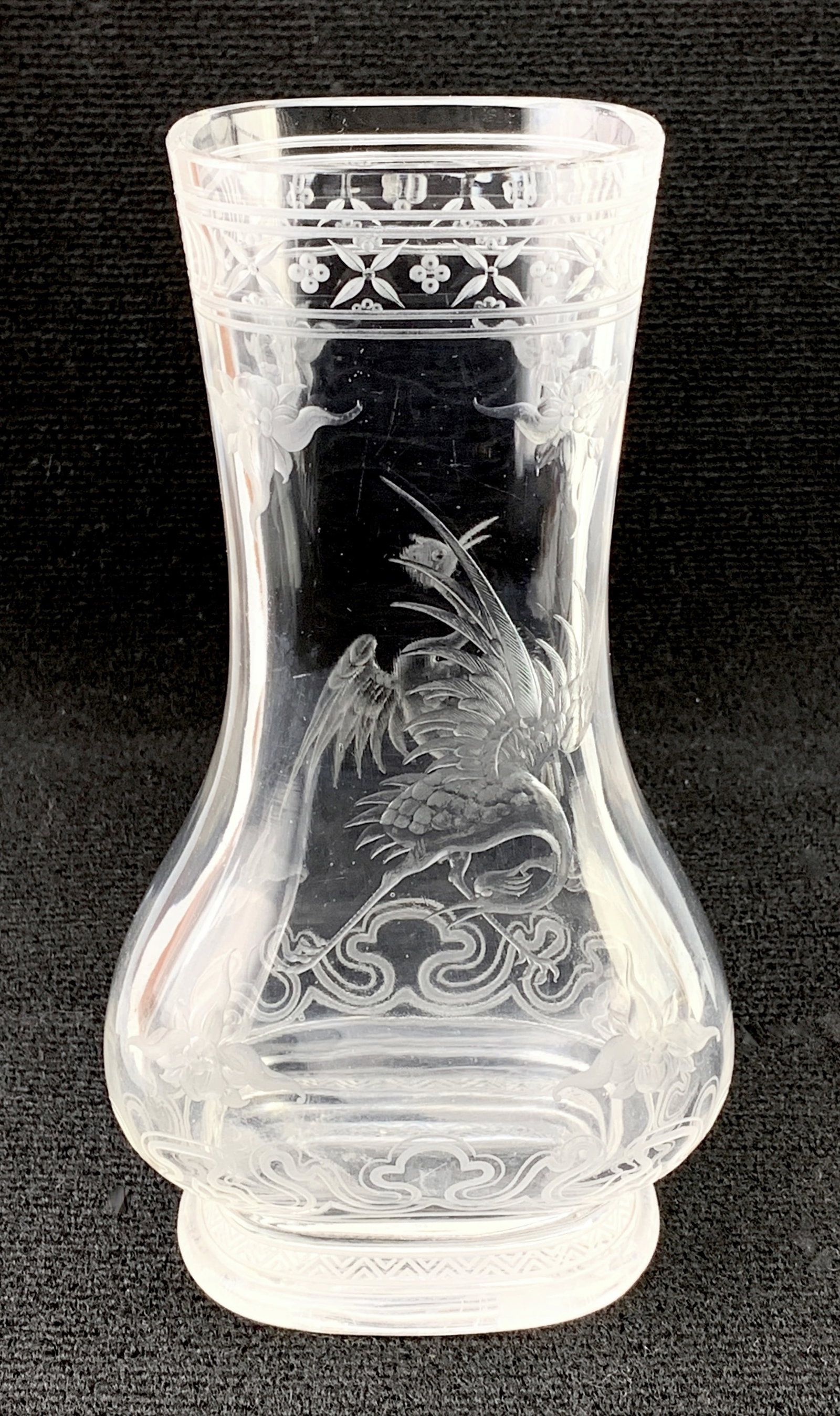 Attributed to Baccarat L's Calier de Cristal Vase: Ernest Baptiste LeVeille (1841-1913), Japonism glass vase with finely carved herons and foliage, not signed, very good condition, 10" height..Eligible for in-house shipping (U.S. only). Please