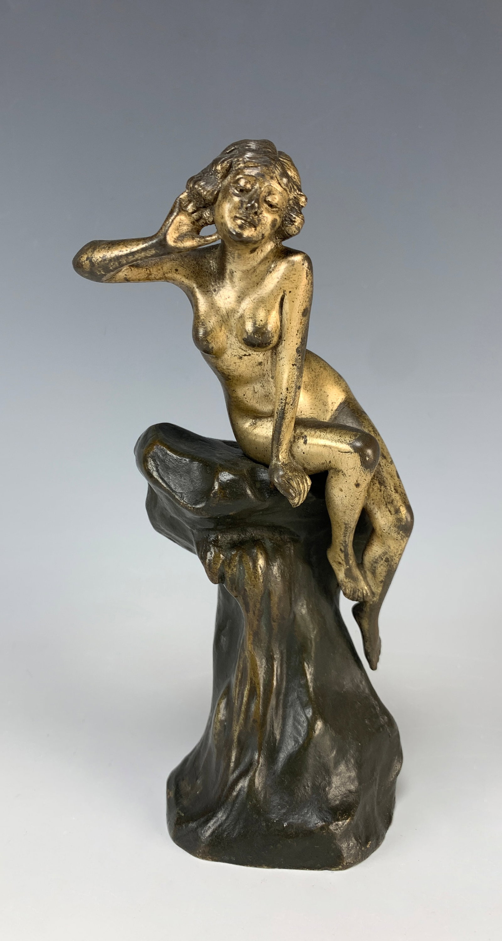 Affortunato Gori Bronze Art Nouveau Nude Sculpture: Circa 1900. Affortunato Gori (active 1895-1925) Italian/French. Two-tone patinated bronze, signed on the reverse A. Gori. 7.5" tall, upper area of nude with wear to patina from age, otherwise