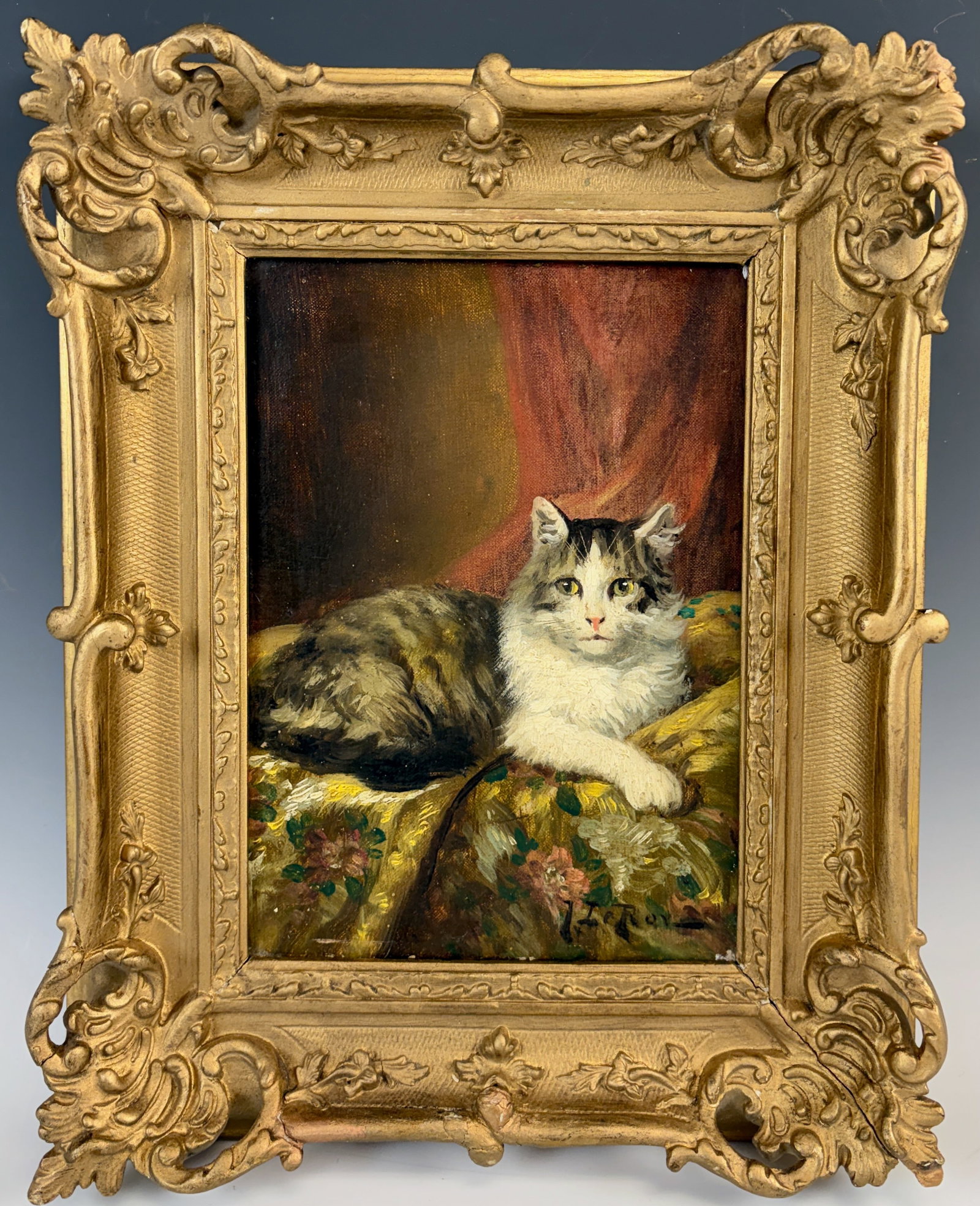 Jules LeRoy Resting Cat Painting: Jules Gustav Leroy (France, 1856-1921) Circa 1880, oil on canvas of a cat resting upon a blanket. LeRoy is most well known capturing the charms of cats often within detailed interiors, signed lower