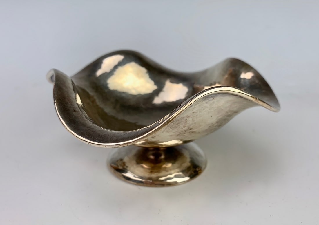 Clemens Friedell Sterling Silver Bowl, Pasadena CA: Clemens Friedell (1872-1973) hand hammered sterling silver undulating bowl by the mportant Pasadena, California silversmith, signed "Sterling Friedell Pasadena", hand wrought and signed in script "Cle