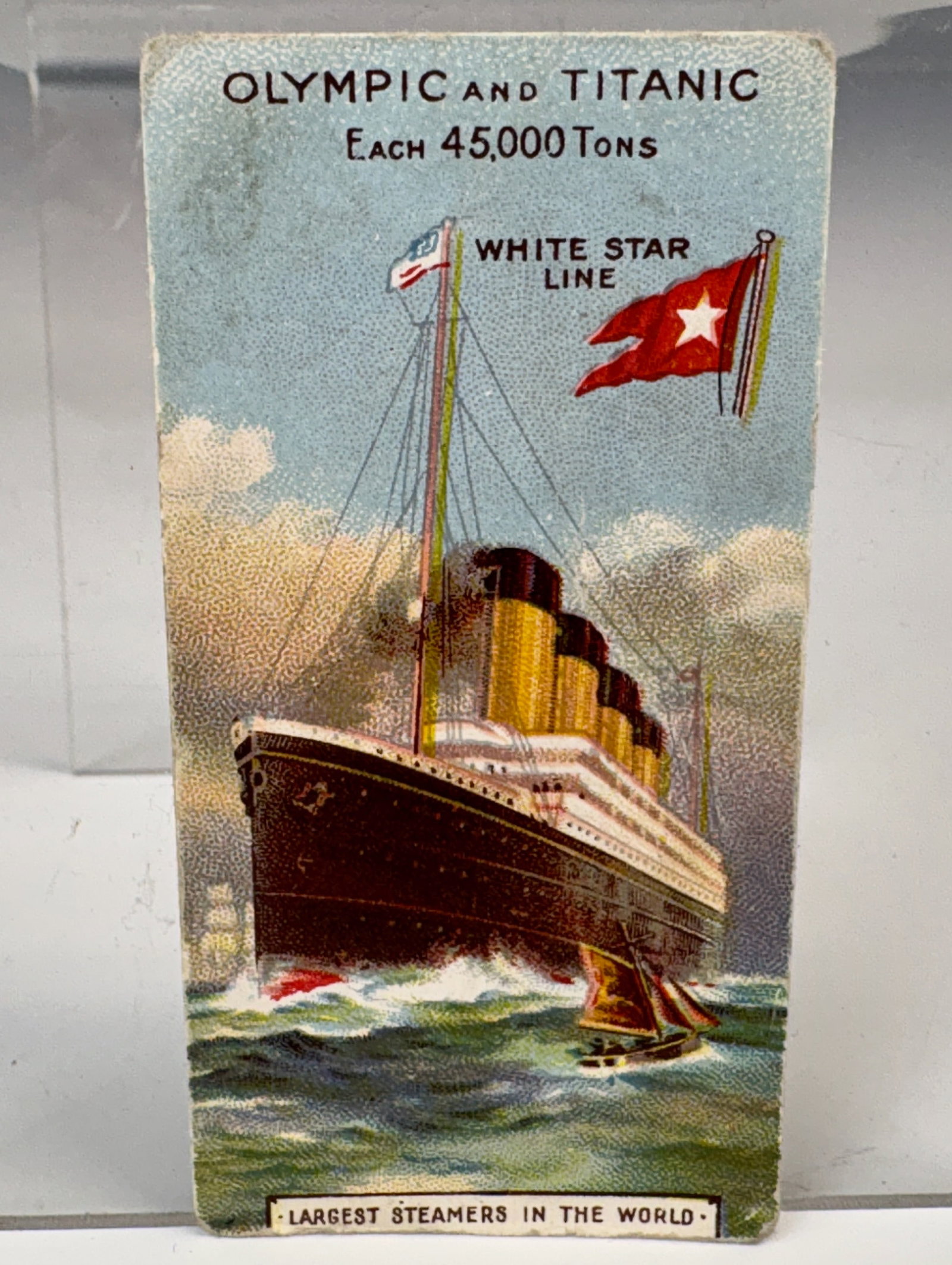 Titanic & Olympic Advertising Trade Card Cadbury: Colorful trade card of the Olympic and Titanic ships, White Star Line for The Cadbury Chololate Company, good condition. 2.75" x 1.5".Eligible for in-house shipping (U.S. only). Please inquire.