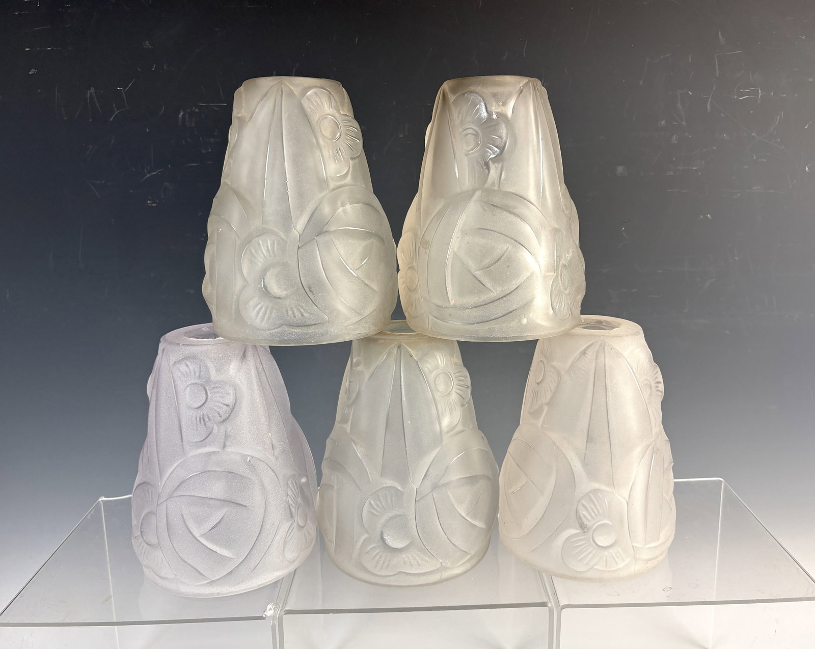 Set of 6 Signed Degue Art Deco Glass Shades: Circa 1920, group of 6 clear frosted French art glass shades with matching raised deco decoration, all with standard 1-1/8" fitter openings, small chips on inside of fitter and a few minor flea bites 