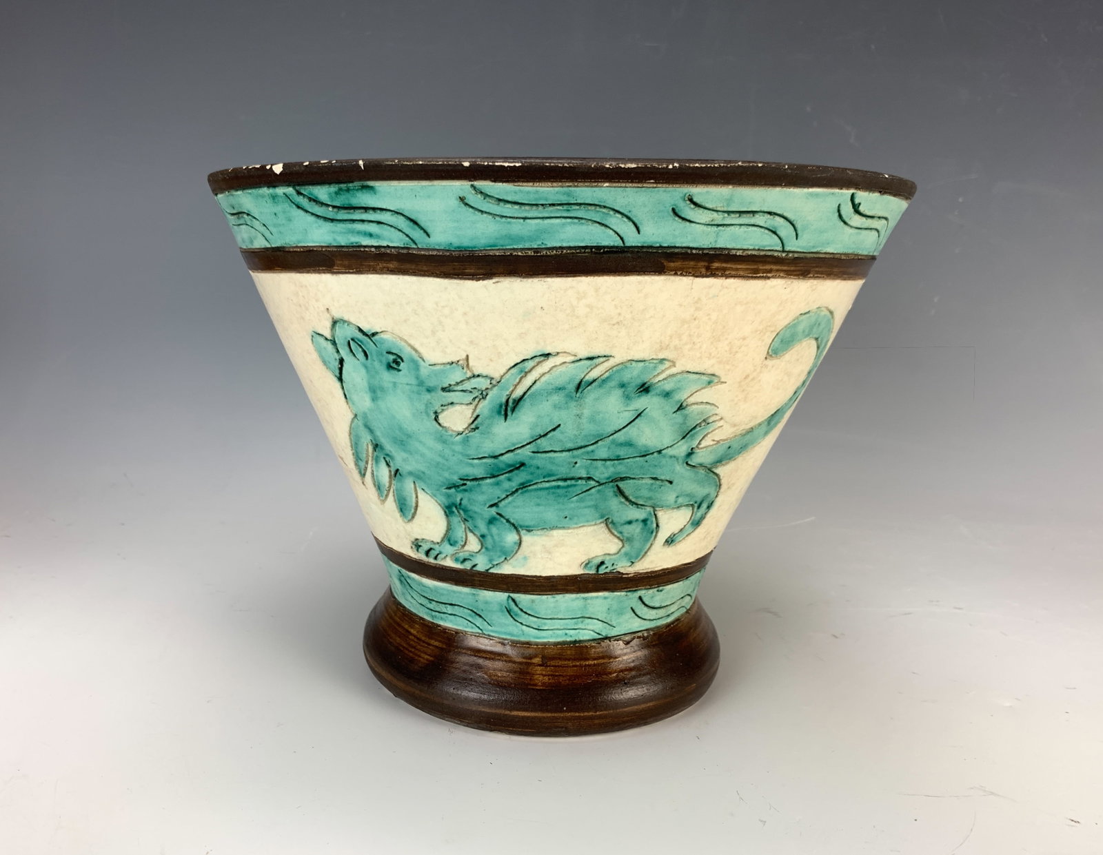 Jerome Massier Pottery Vase w/Chimera & Alligator: Having a conical shape is this rare and wonderful pottery vase decorated with a hand-painted chimera and alligator in colors of green and dark brown. Signed on the bottom "J. Massier, Vallauris," it i